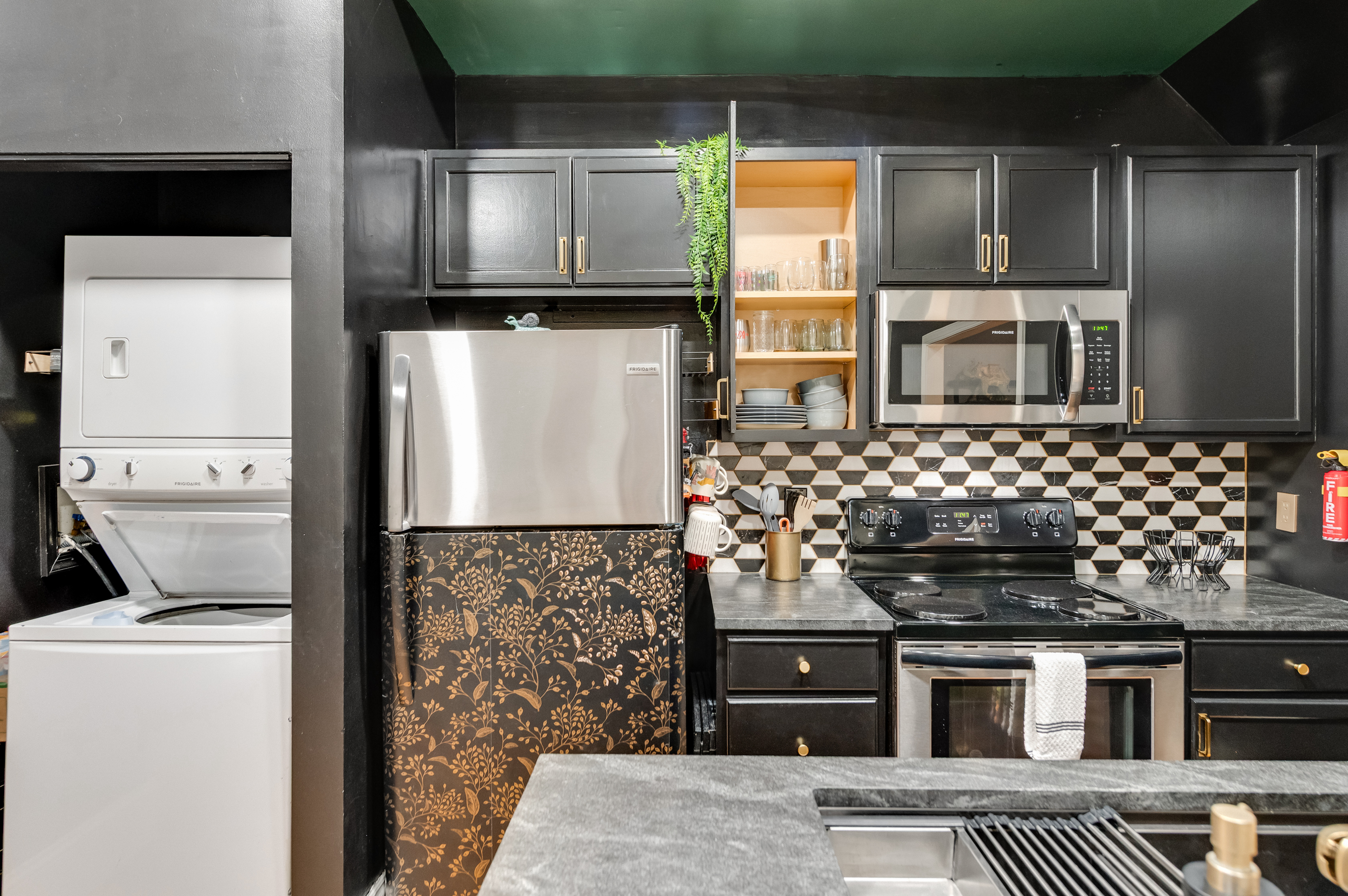 Stylish Kitchen: Gourmet finishes, modern appliances, and quirky decor await your culinary adventures!