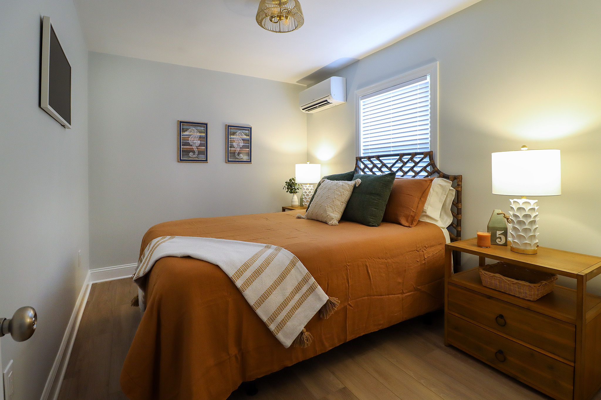 The queen bedroom features a luxurious queen size Nectar mattress, a Samsung Frame TV, a sound machine, and a closet