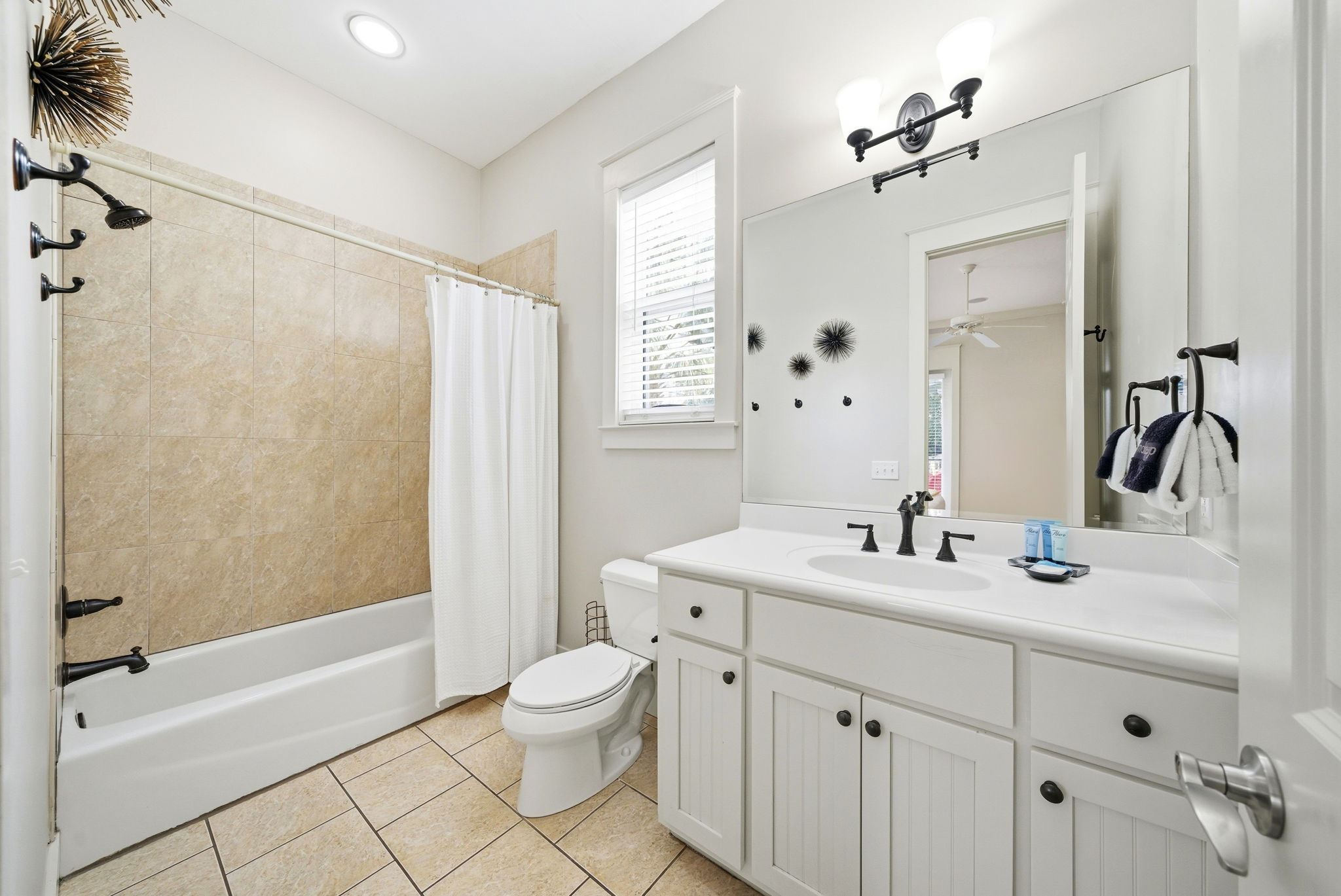 Clean, modern, and stocked—our ensuite bathrooms provide items needed to get you started for a refreshing stay.