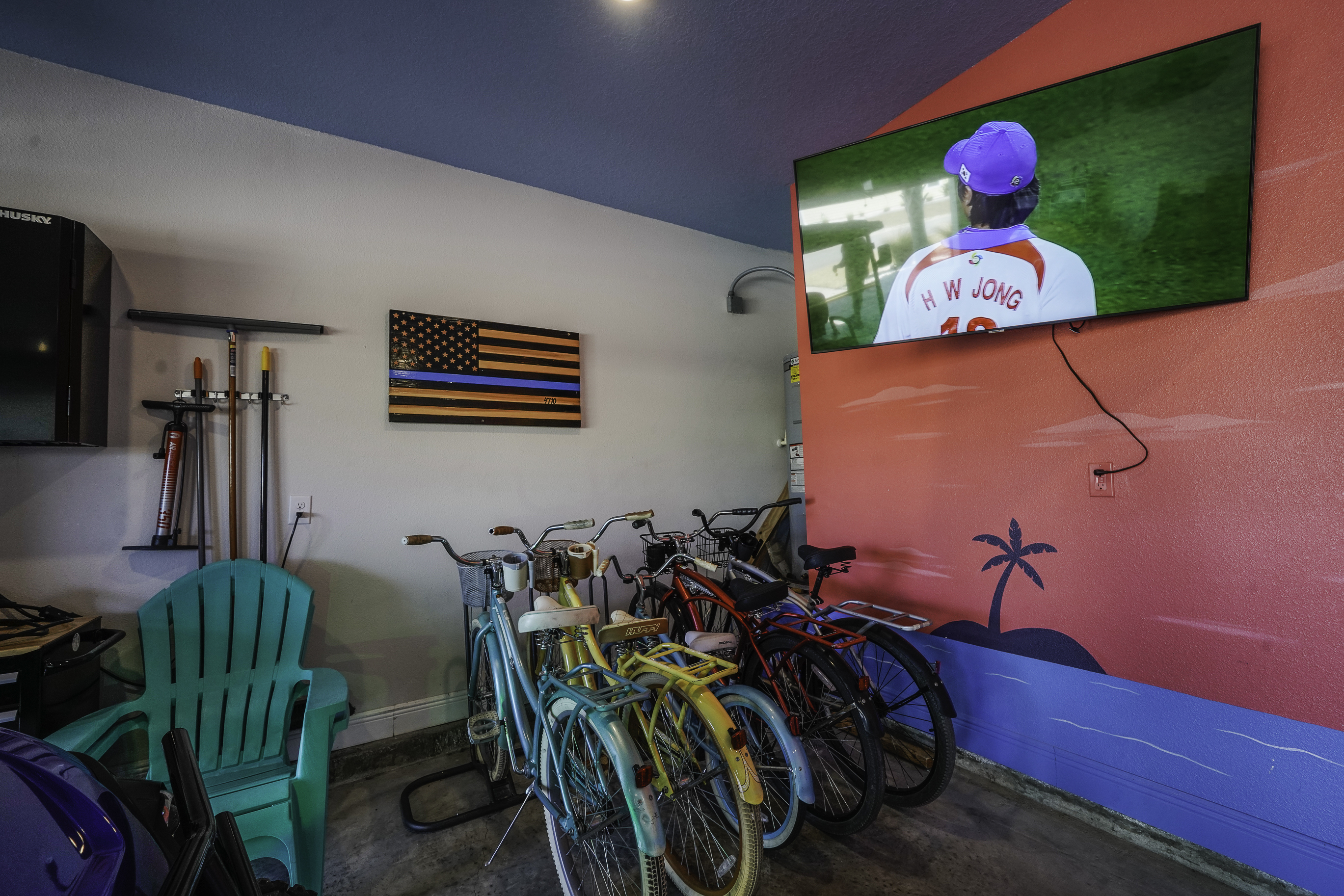 Enjoy the garage with a TV, arcade games, and plenty of seating for friends and family.