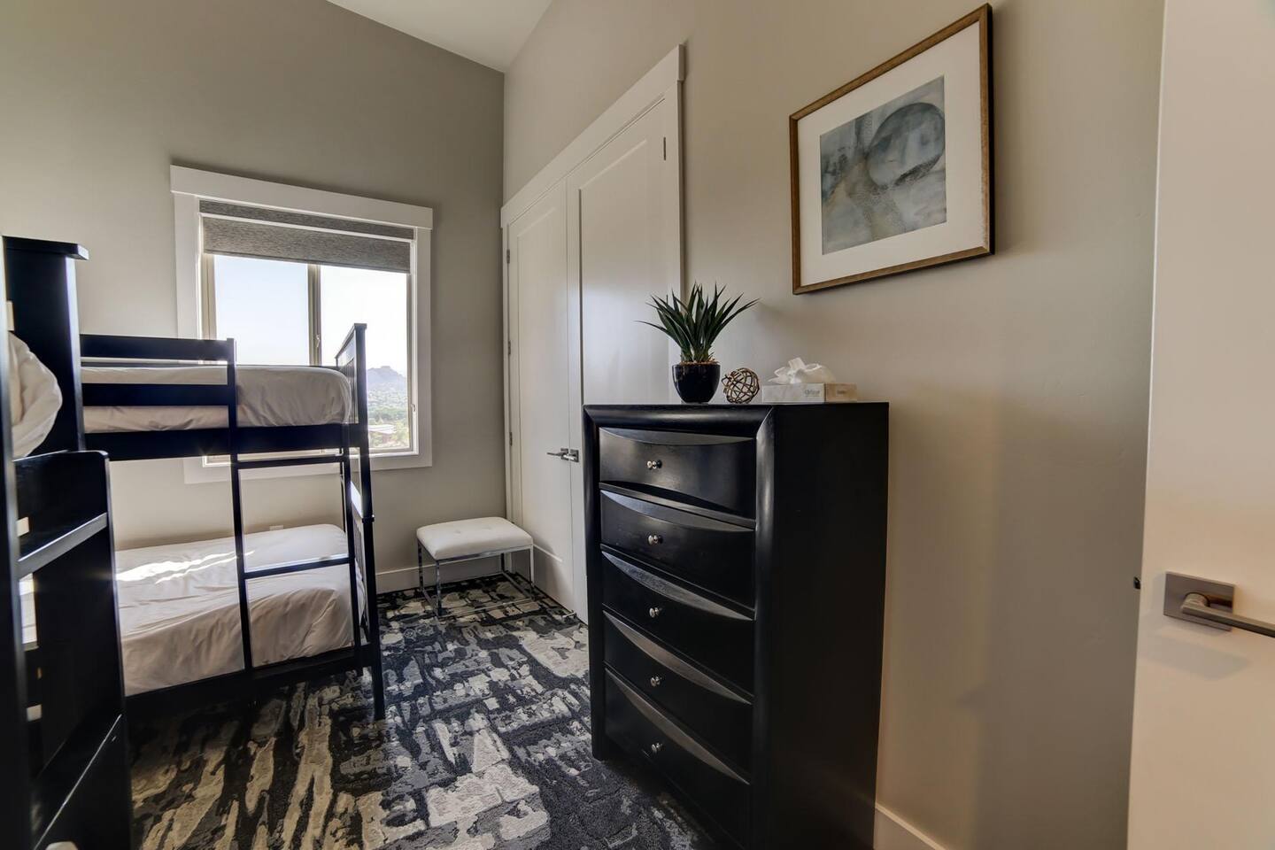 Bedroom 3 with a dresser