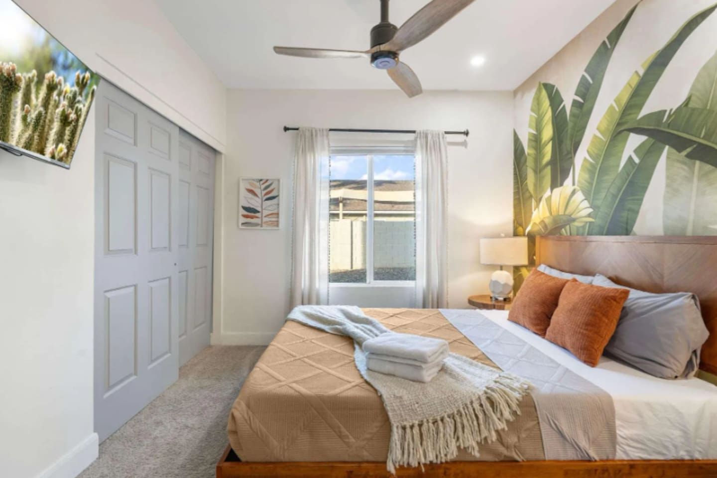 Bright guest bedroom with tropical botanical touches.