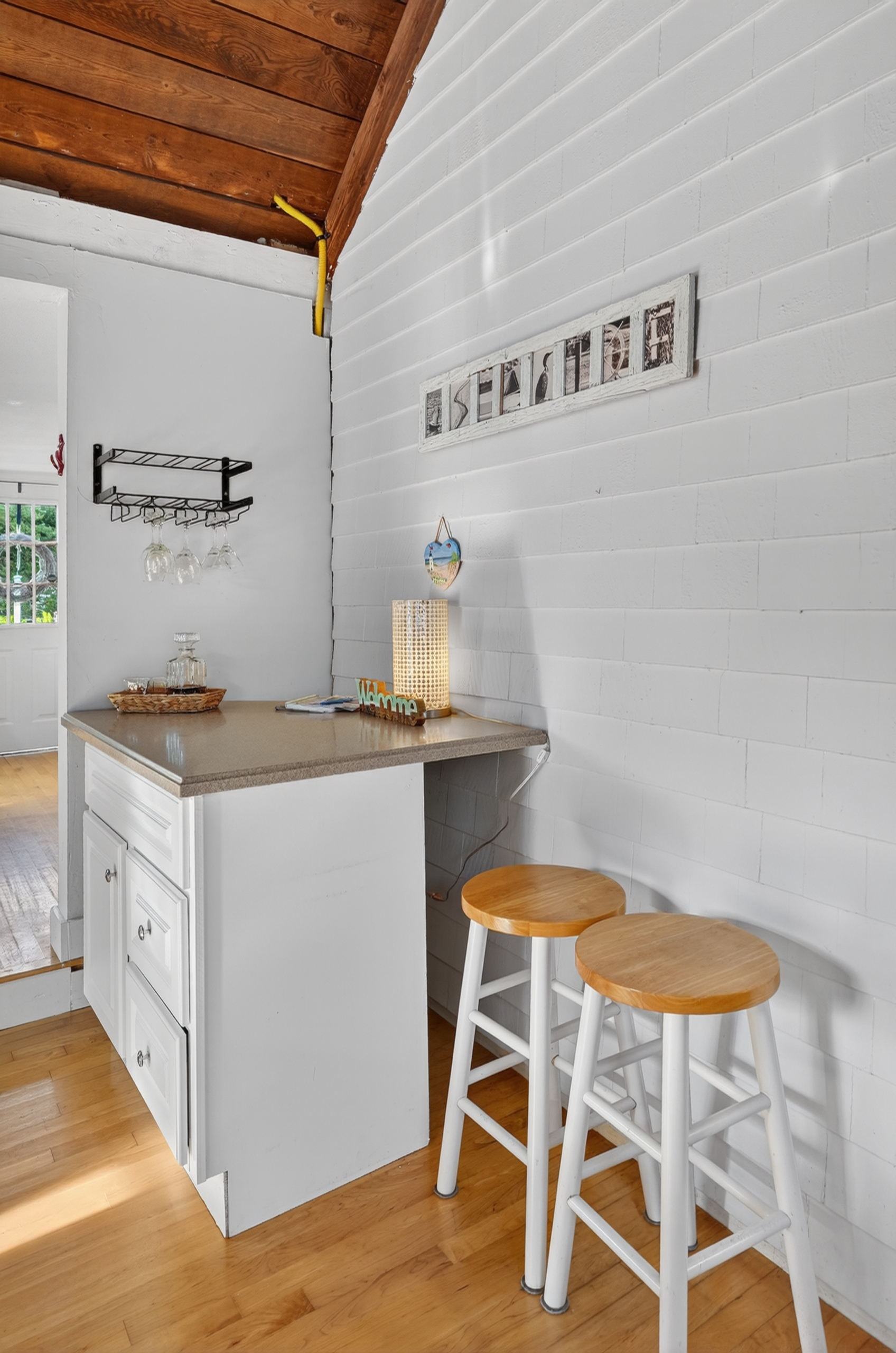 Breakfast bar with seating for two—perfect for a quick bite, morning coffee, or keeping the chef company.
