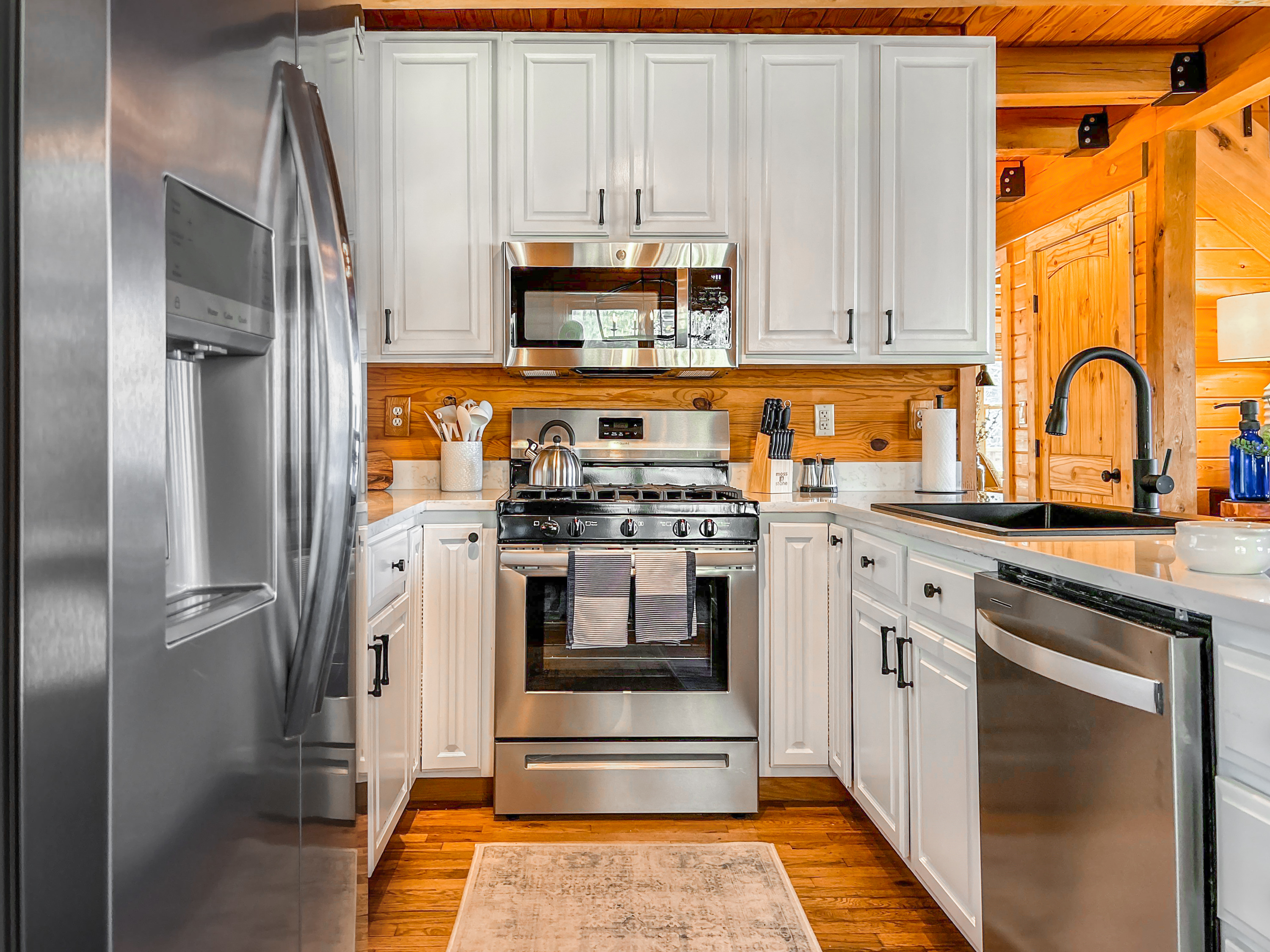 Storage in the kitchen is ample! And the refrigerator can fit weeks' worth of groceries.
