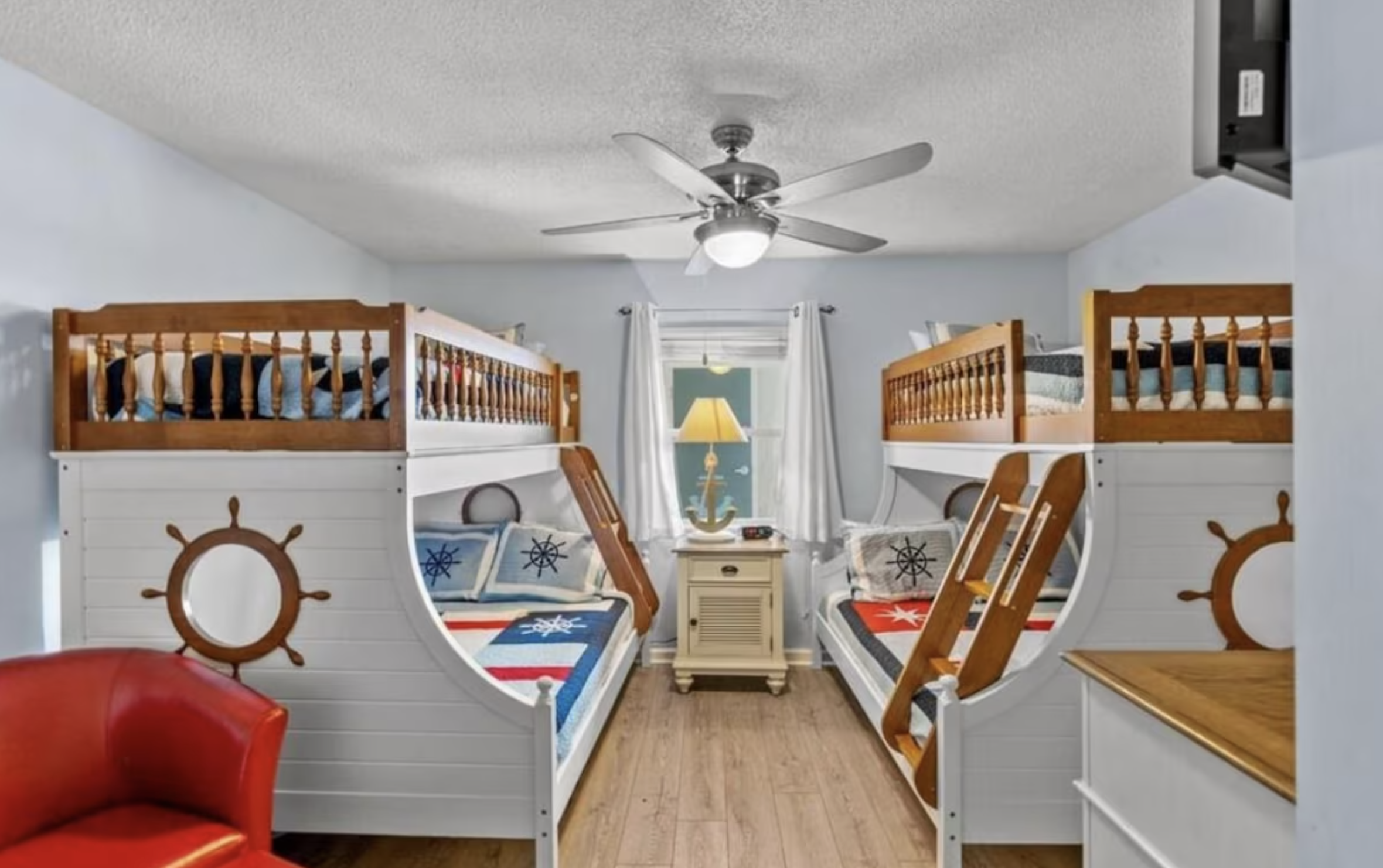 The nautical-themed bunkbed room can sleep as many as 6 people! 2 full beds and 2 singles.