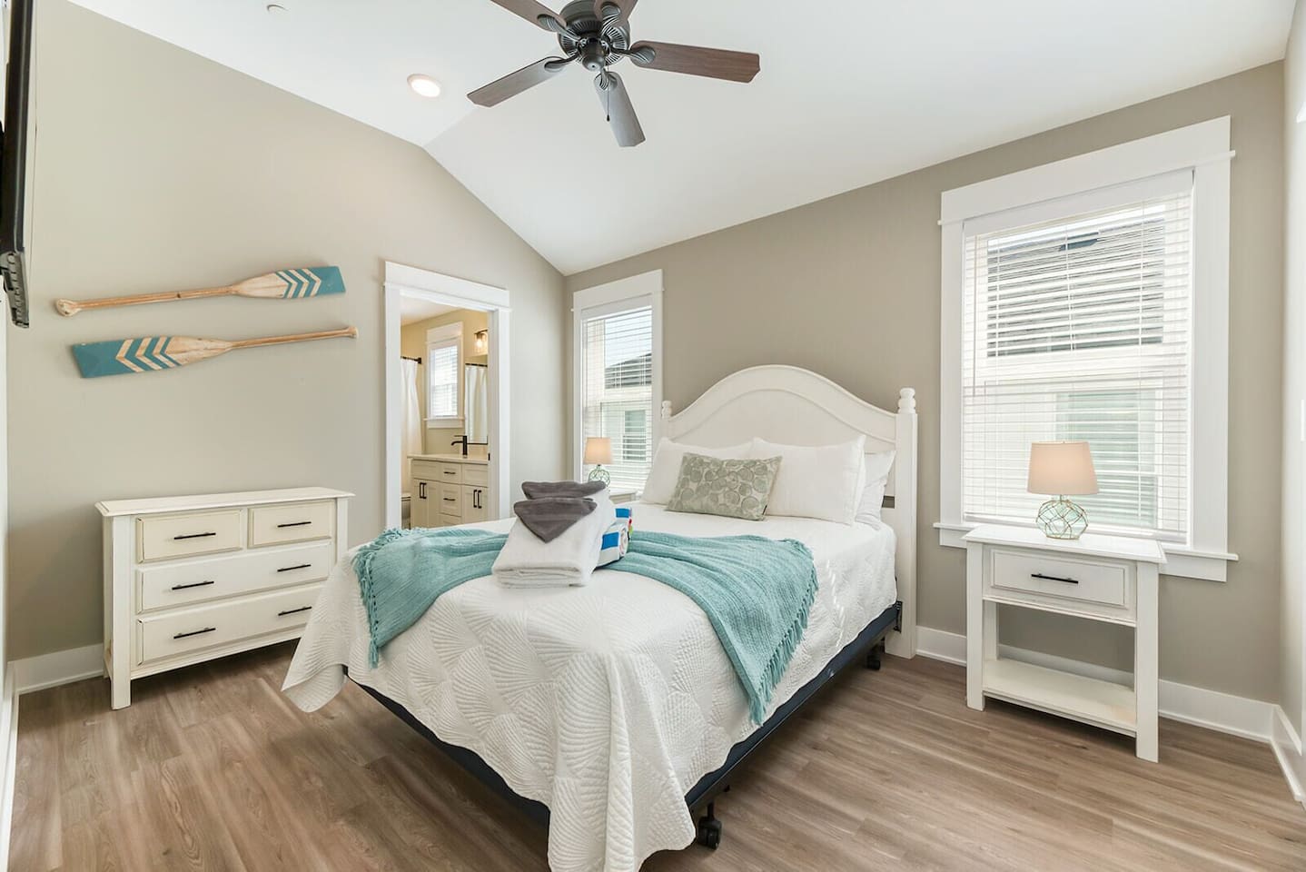 Bright and inviting queen bedroom designed for a comfortable night’s rest.