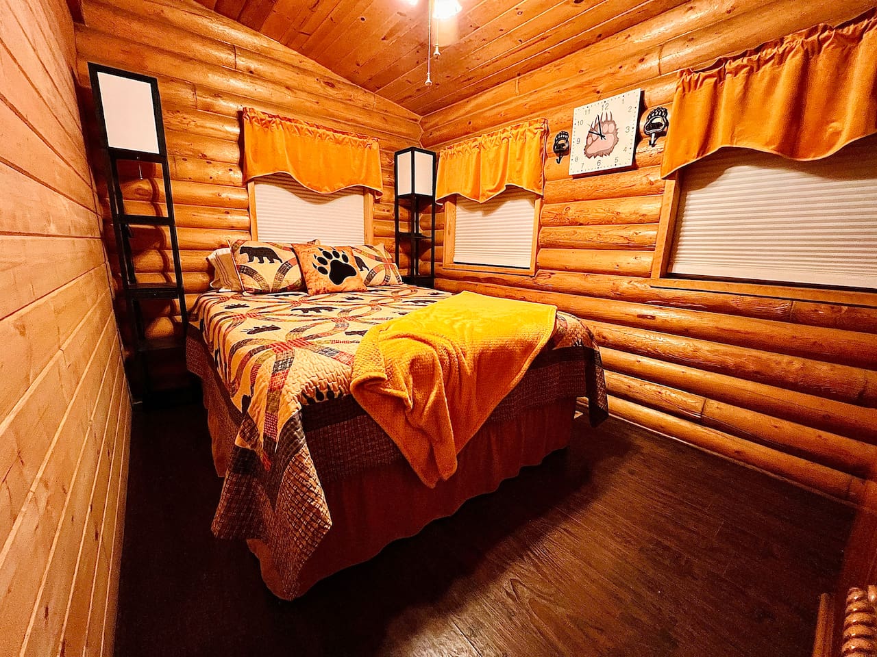 Paw's Place features a queen bed and is located on the main floor.