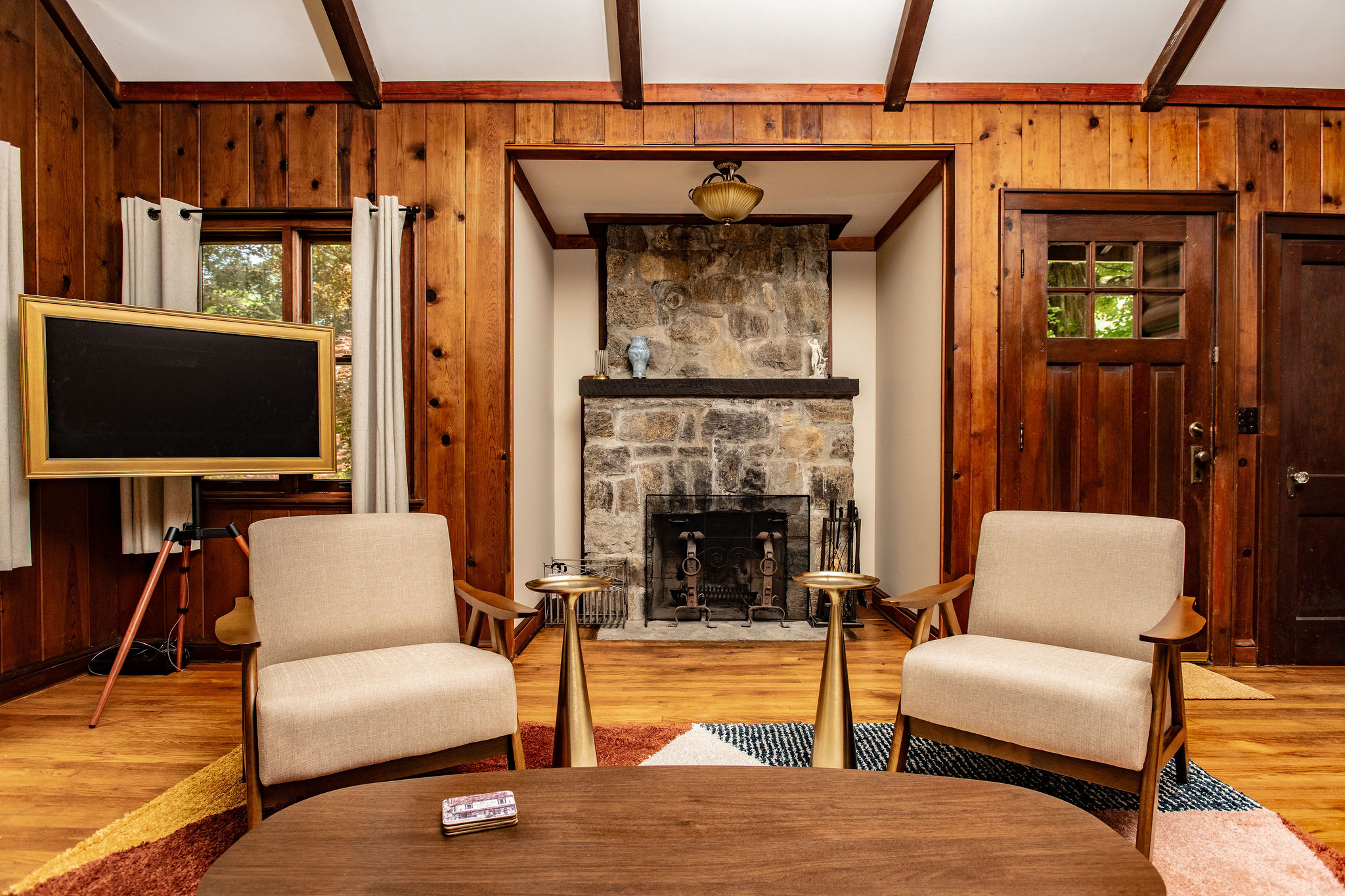 Gather around the stone fireplace on cool Hudson Valley evenings