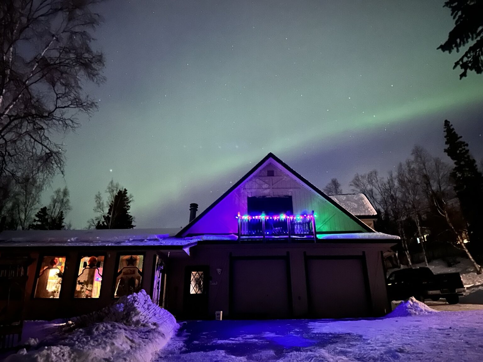 Northern lights over The Magic Moose Bed & Breakfast in Eagle River, Alaska