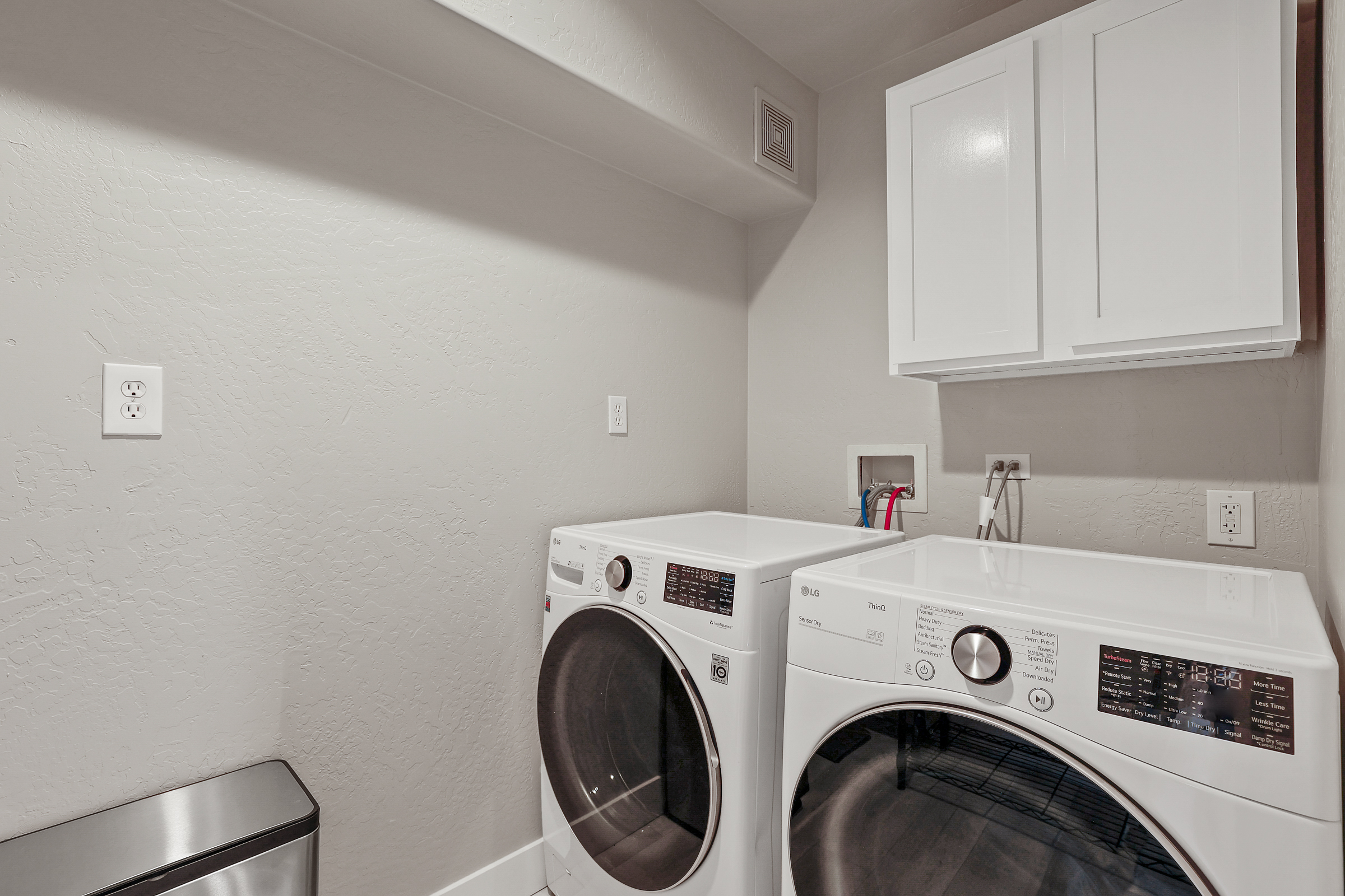 Washer and dryer on both floors of duplex
