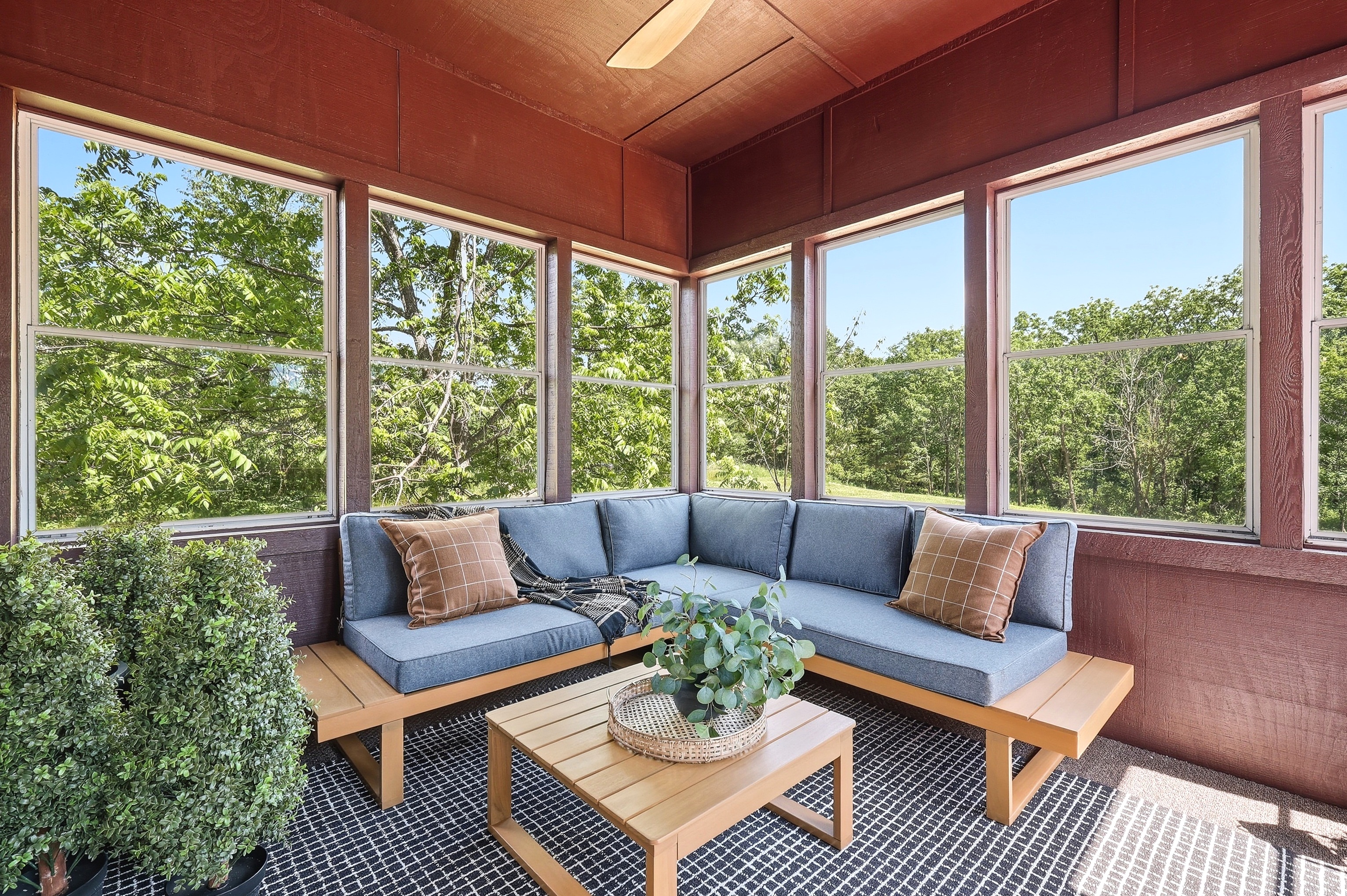 Hang out in the main level sunroom overlooking the back yard!