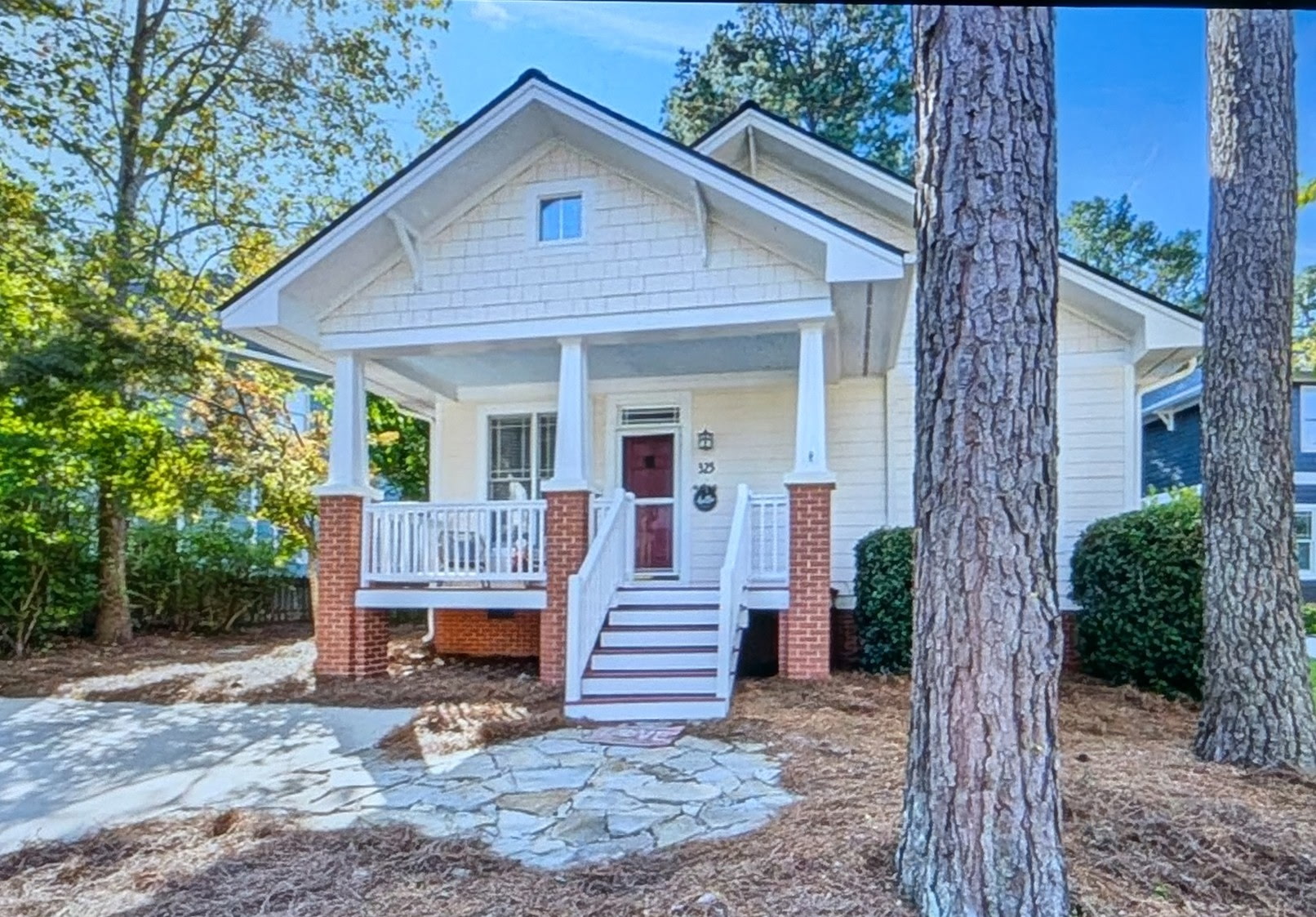 Beautiful cottage in quiet neighborhood with mature trees. Located in heart of Apex.