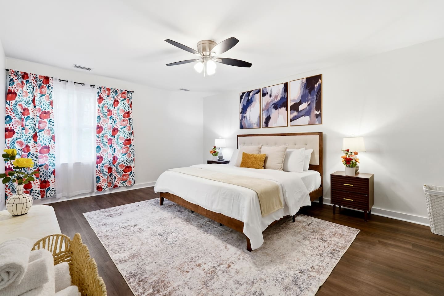 Cozy second-level bedroom featuring a king bed, a Roku-powered Smart TV, and located at the end of the hallway to the left at the top of the staircase. This room includes 2 full-body towels, 2 washcloths, and 2 hand towels for your stay.