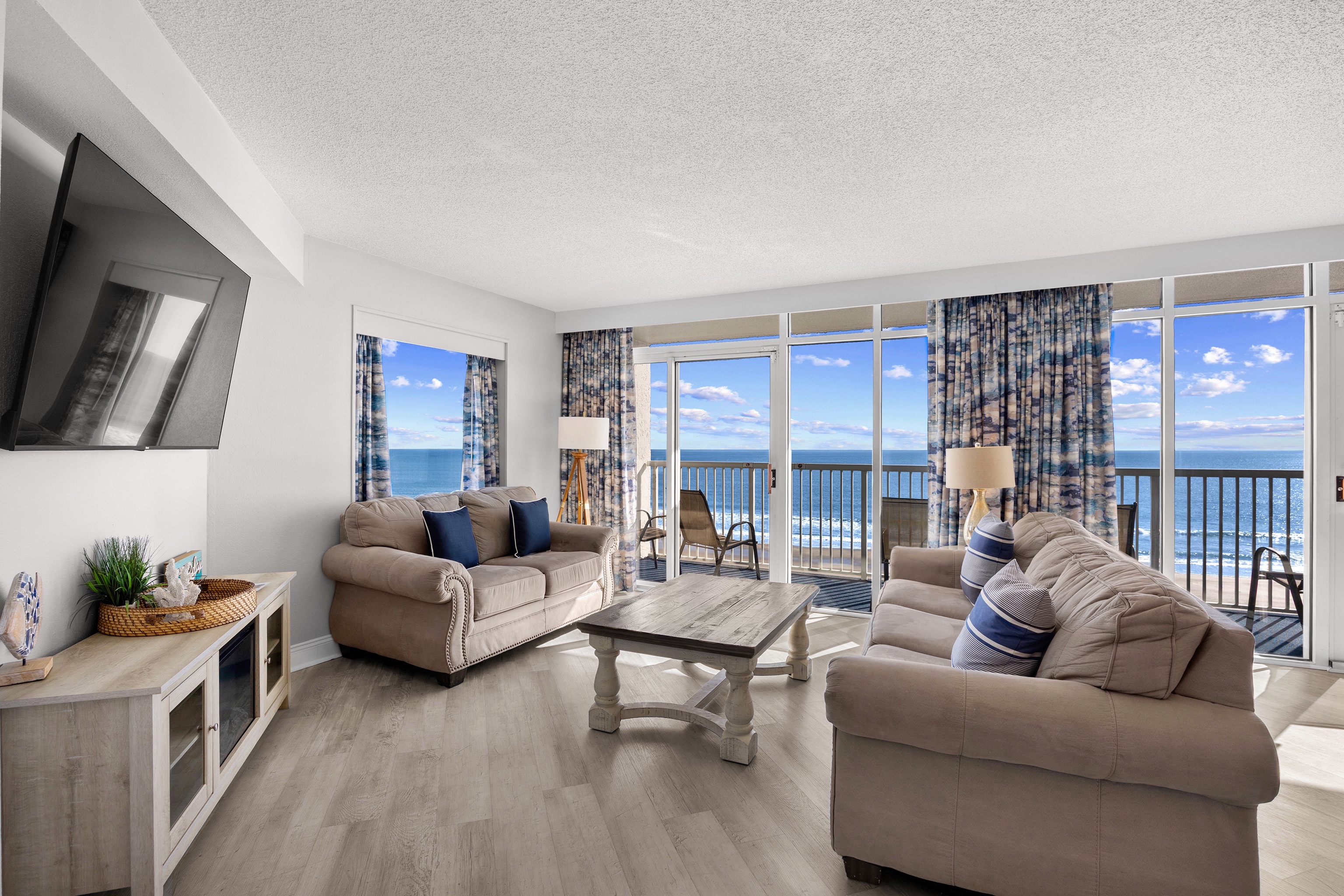Unwind in this gorgeous living room while gazing out at the Atlantic, where beautiful water meets a breathtaking skyline.