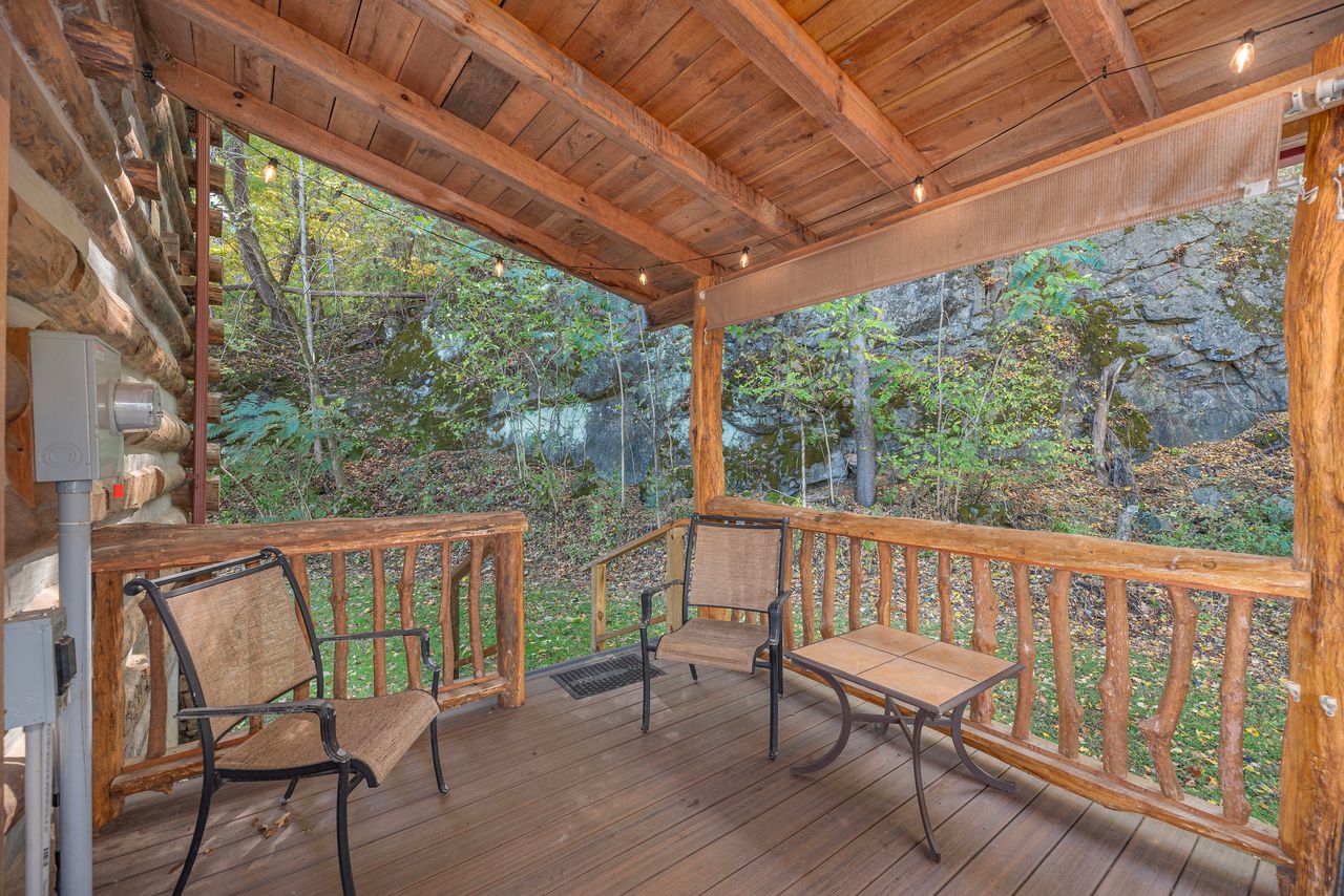 There is seating on the back porch for when you are ready to get out of the hot tub and cool off. 