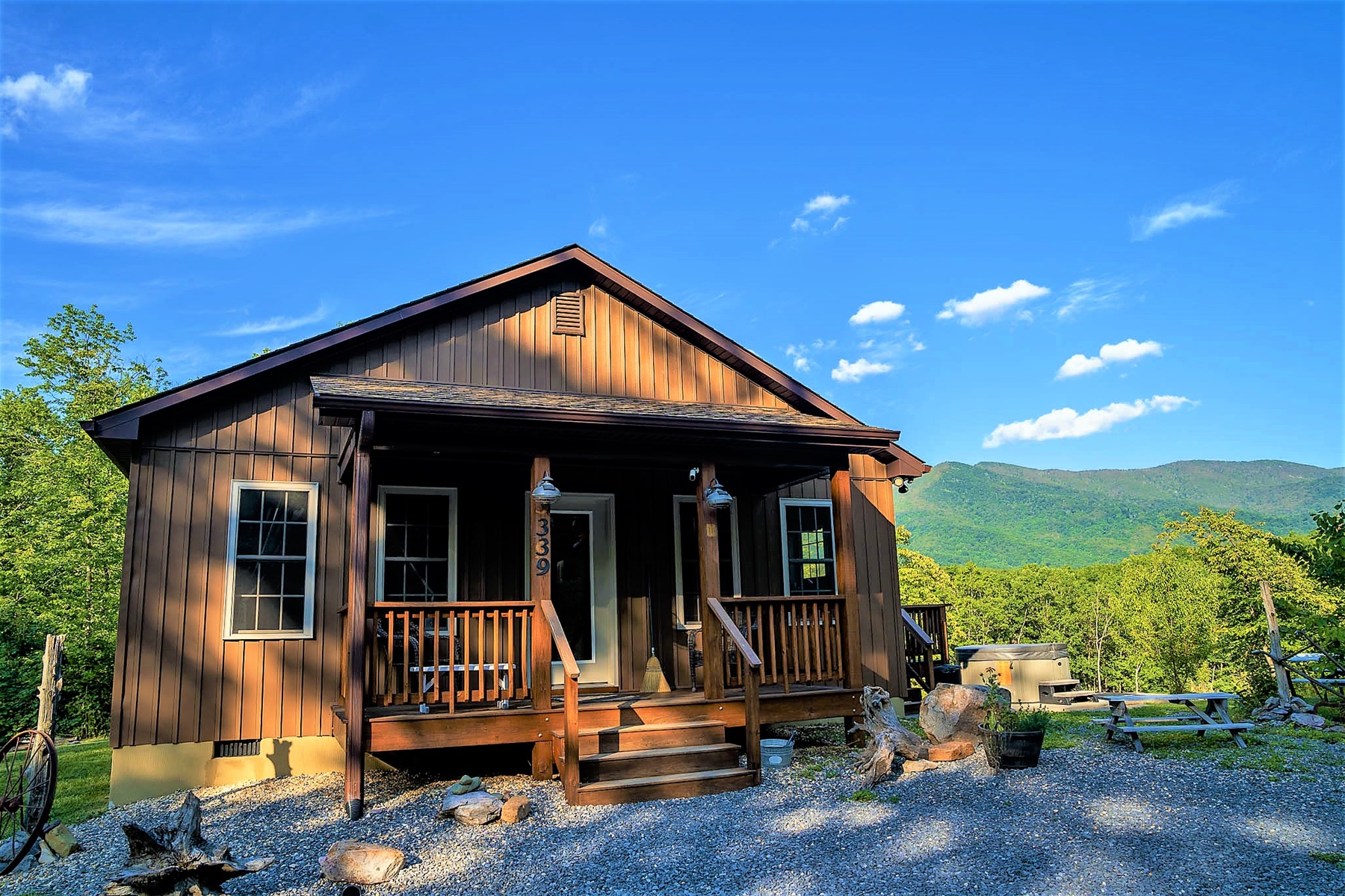 Relax on the deck and take in the quiet surroundings, where fresh mountain air and nature create the perfect escape.