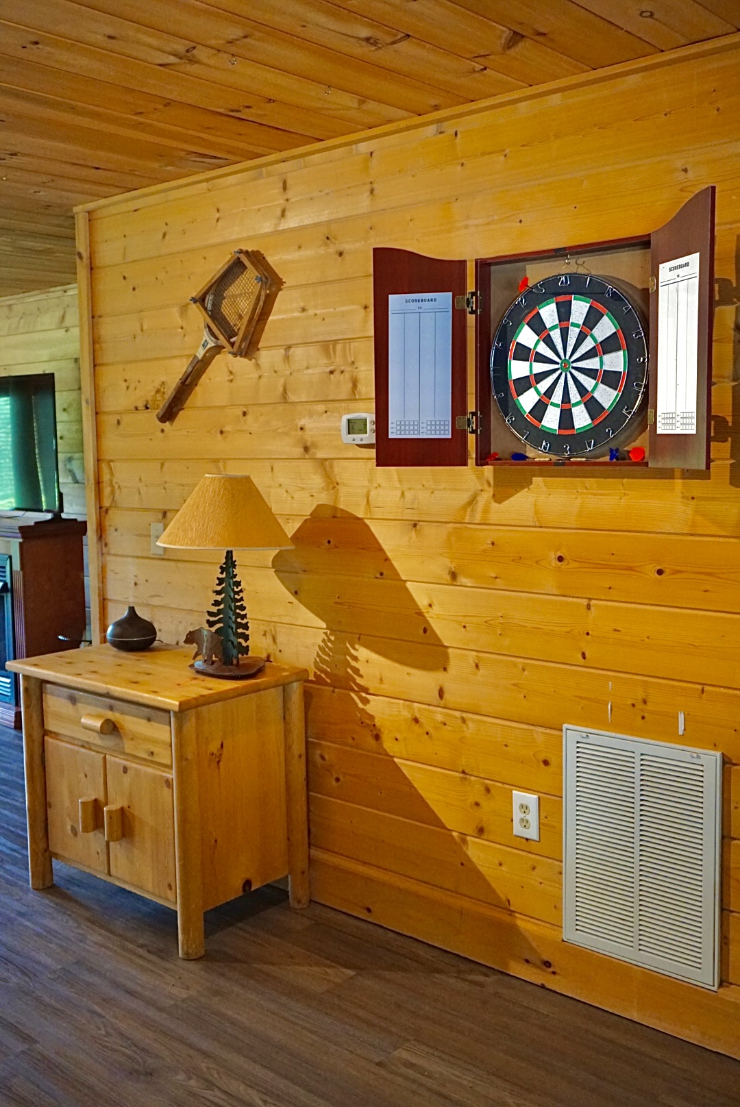 Game Room: Unwind with a friendly dart match and rustic charm on your getaway!
