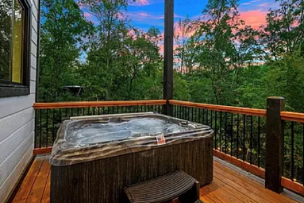Private hot tub with serene forest views.