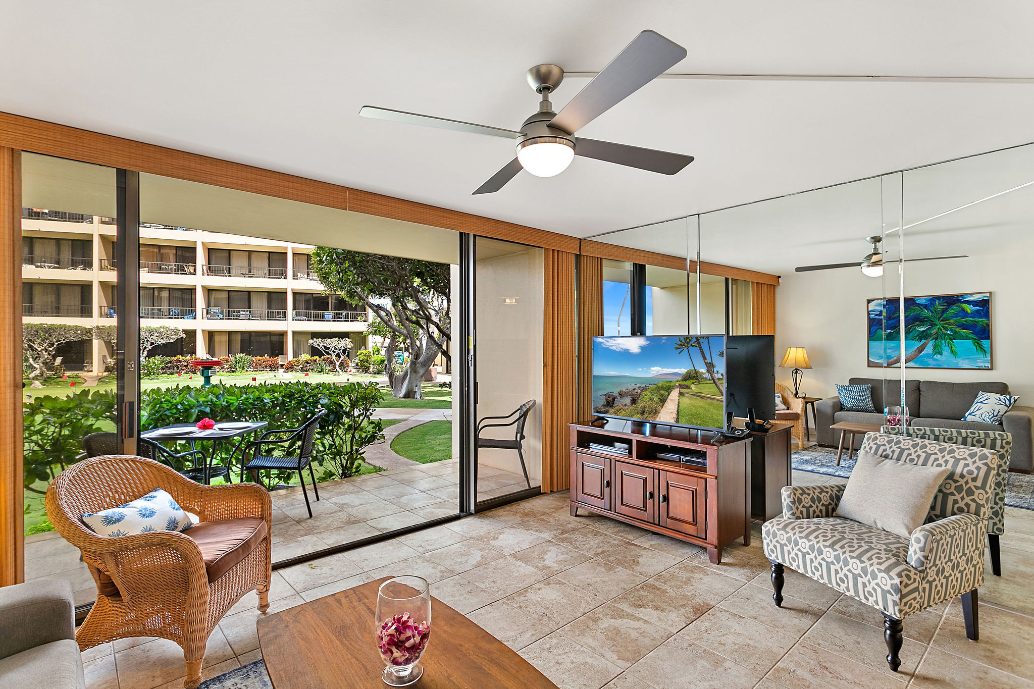 Looking towards the TV from the kitchen you have direct access to the lawn