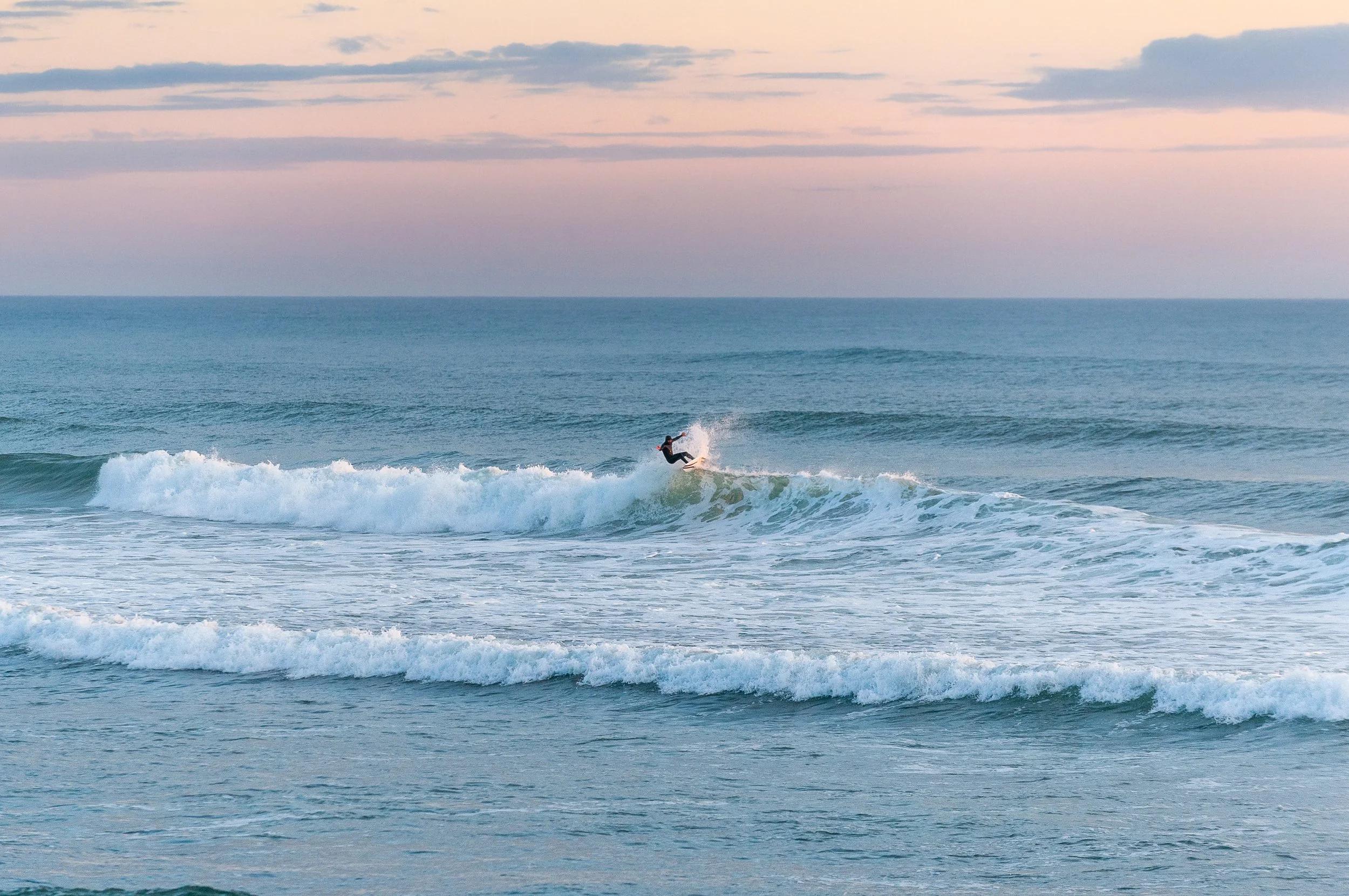 {Westport Surf} Catch waves at Washington's surfing capital, where consistent swells welcome both first-time surfers and seasoned riders.