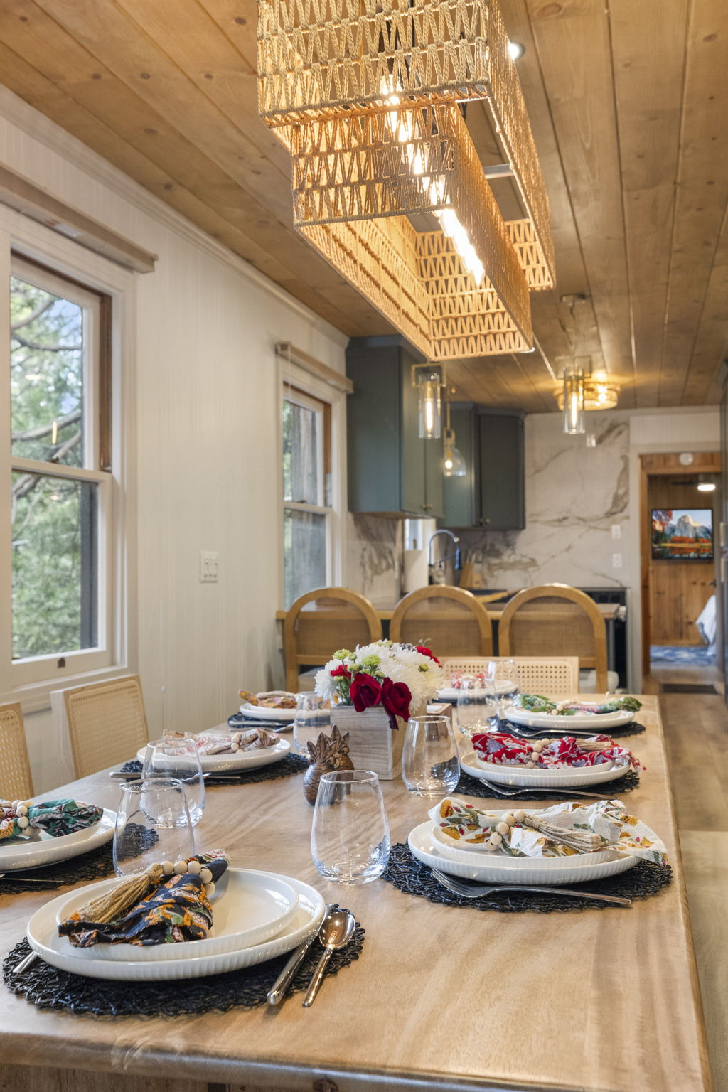 Dining table for up to 10. Up to 6 chairs and a large bench is available for seating. Plenty of dishes for your large groups as well.