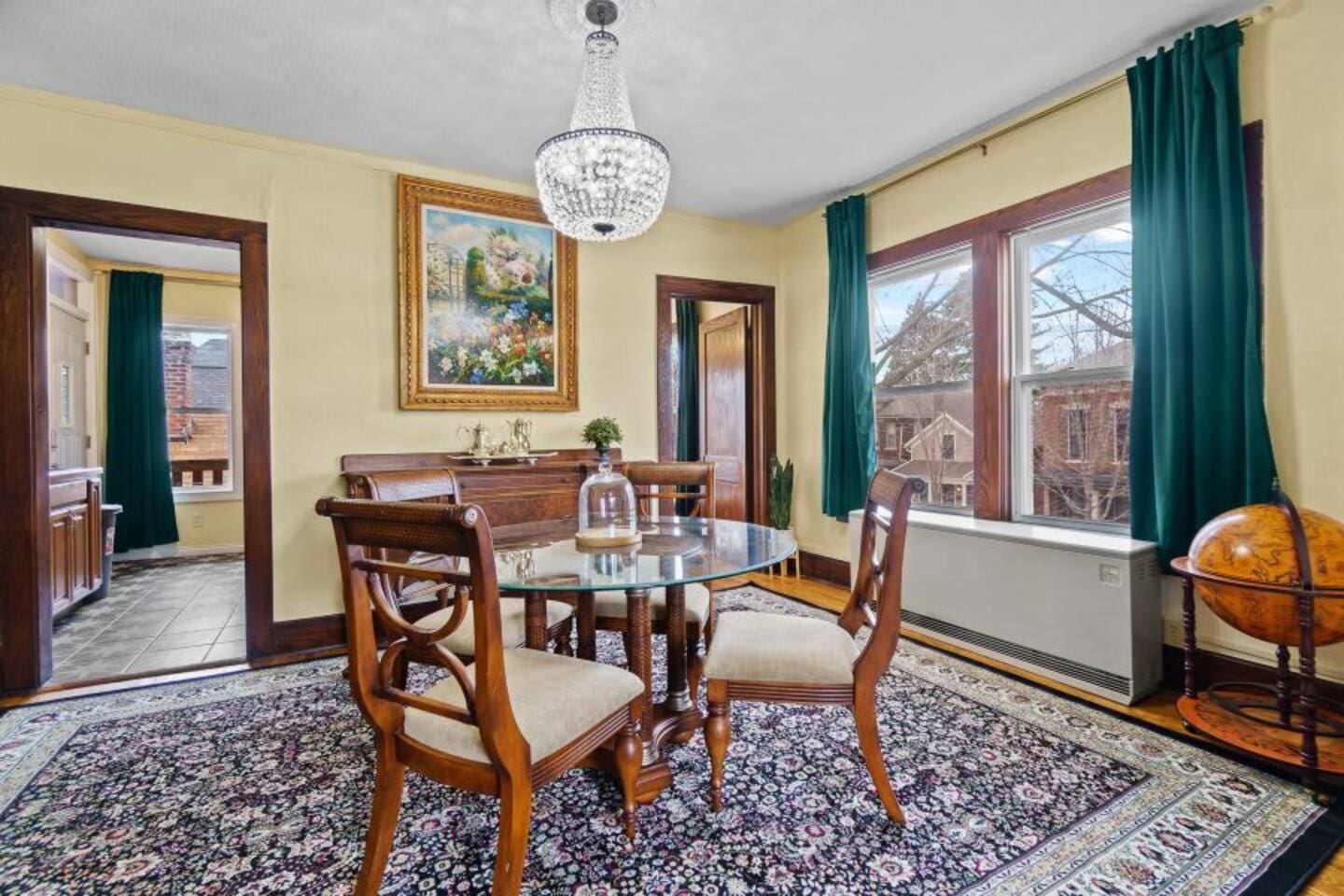 Cozy 4-seater dining area with a window, providing a bright and inviting space for meals and gatherings.