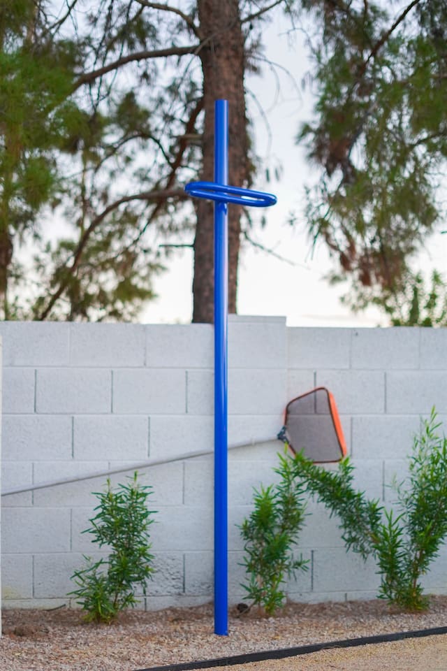Get fit outdoors at the exercise stations, featuring multiple bars designed for a variety of workouts and exercises. This is a reverse leg raise to unleash those abs!