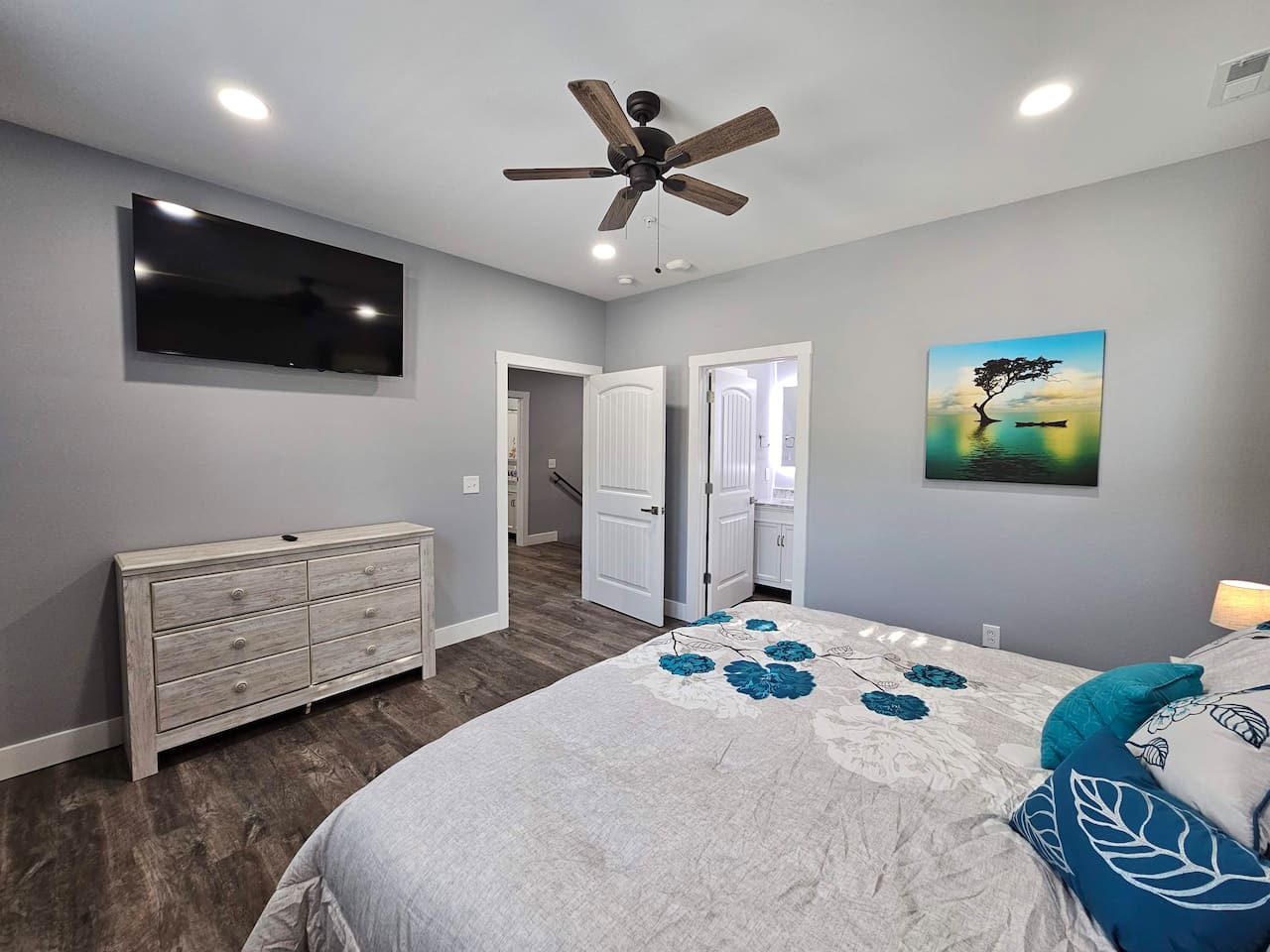 Spacious king suite with smart TV and private bath.