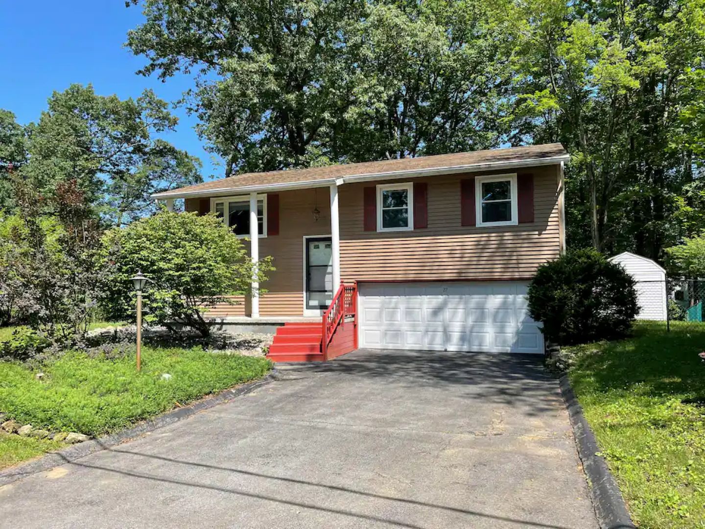 View of the home's front, garage not available to park.