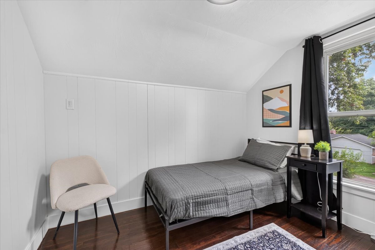 Enjoy the small bedroom at the top of the stairs with a twin bed.