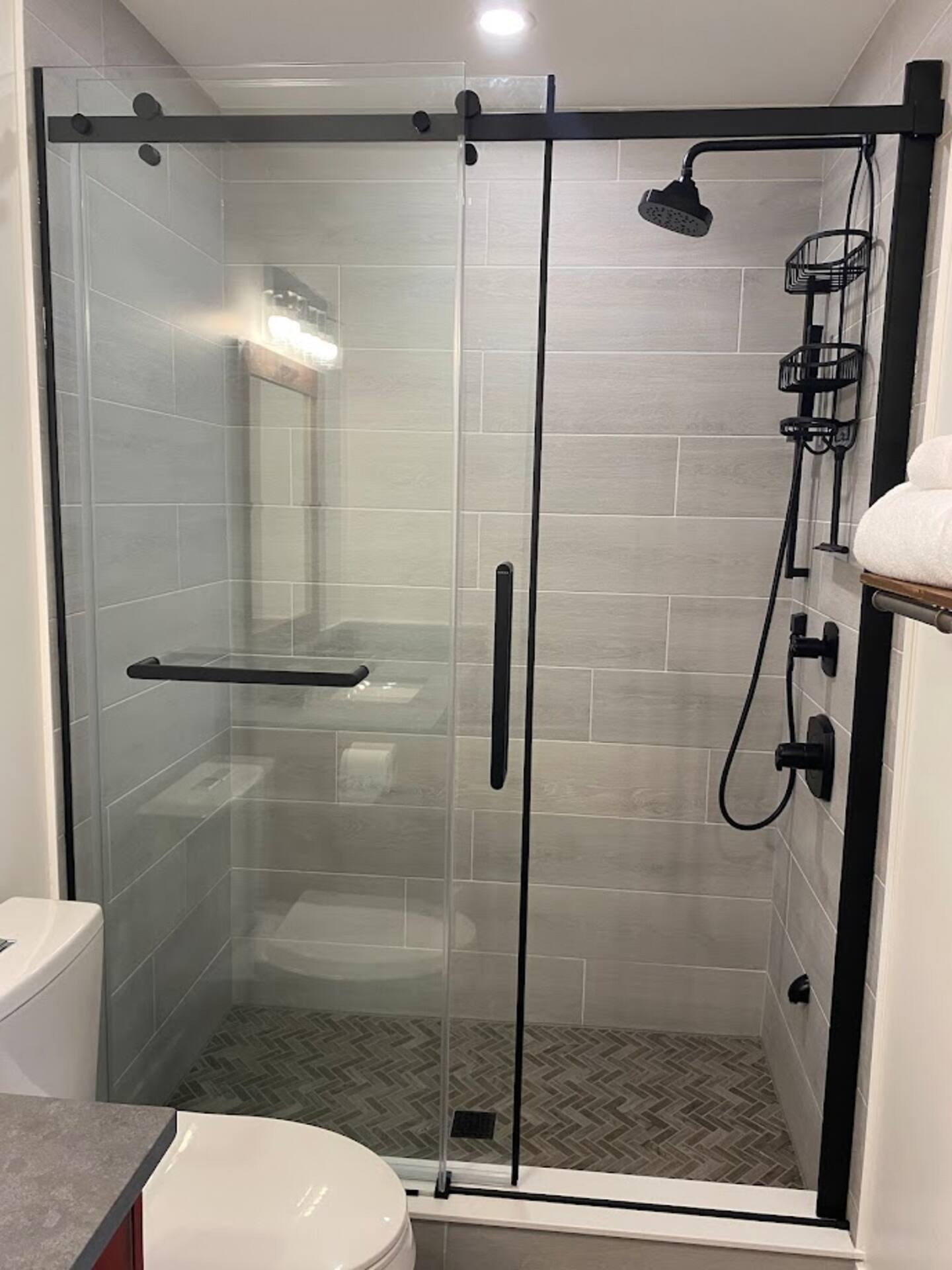 Attractive, well-appointed lower floor bathroom with roomy shower