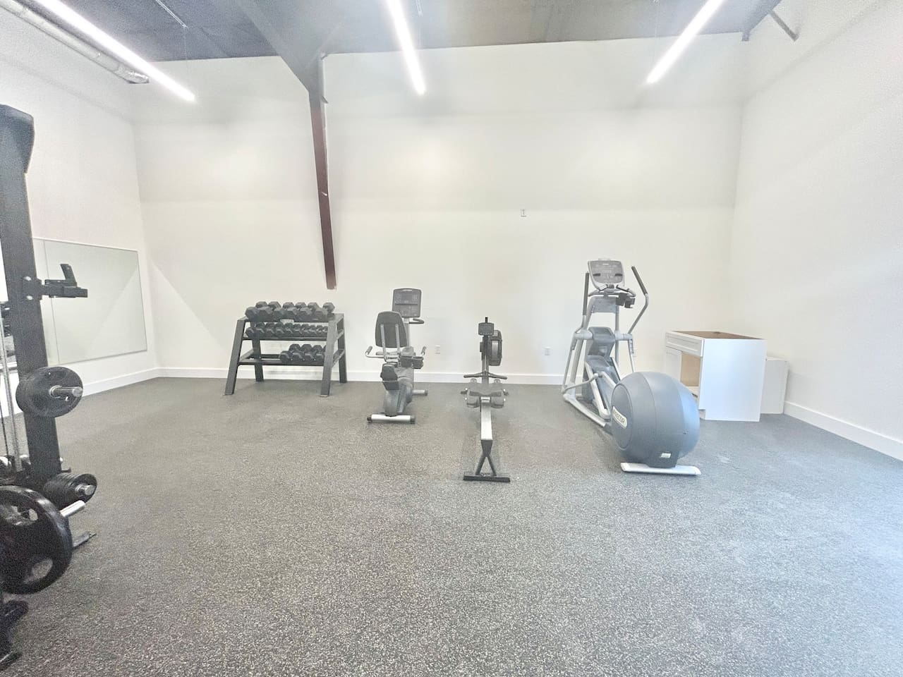 Spacious fitness center with a variety of equipment