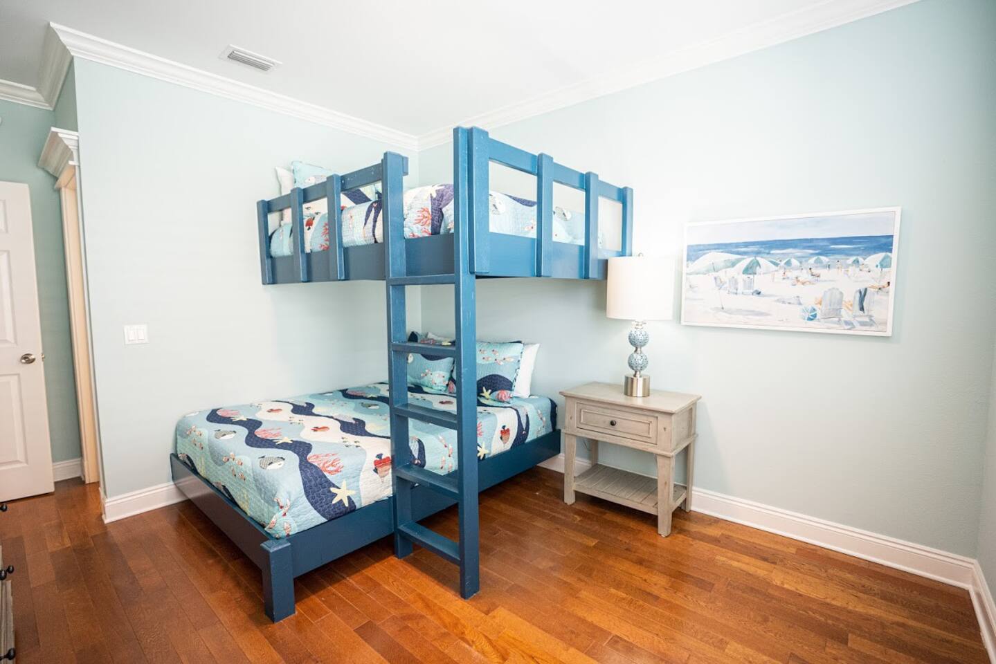 Another view of the same bunk room.  The bathroom is just on the other side of the bed wall.