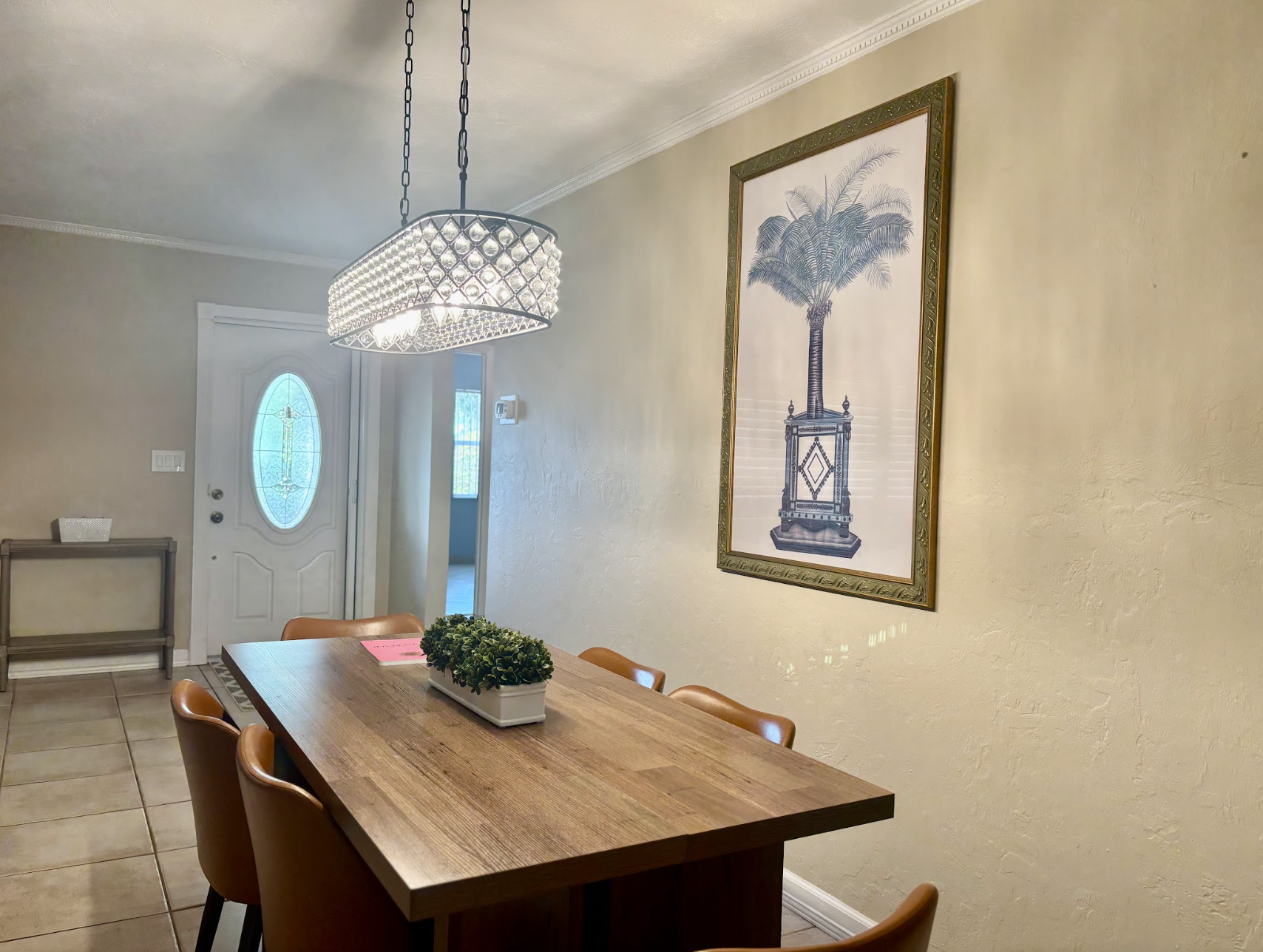 Gather around the table for family meals and games while enjoying the "Old Florida" palm.