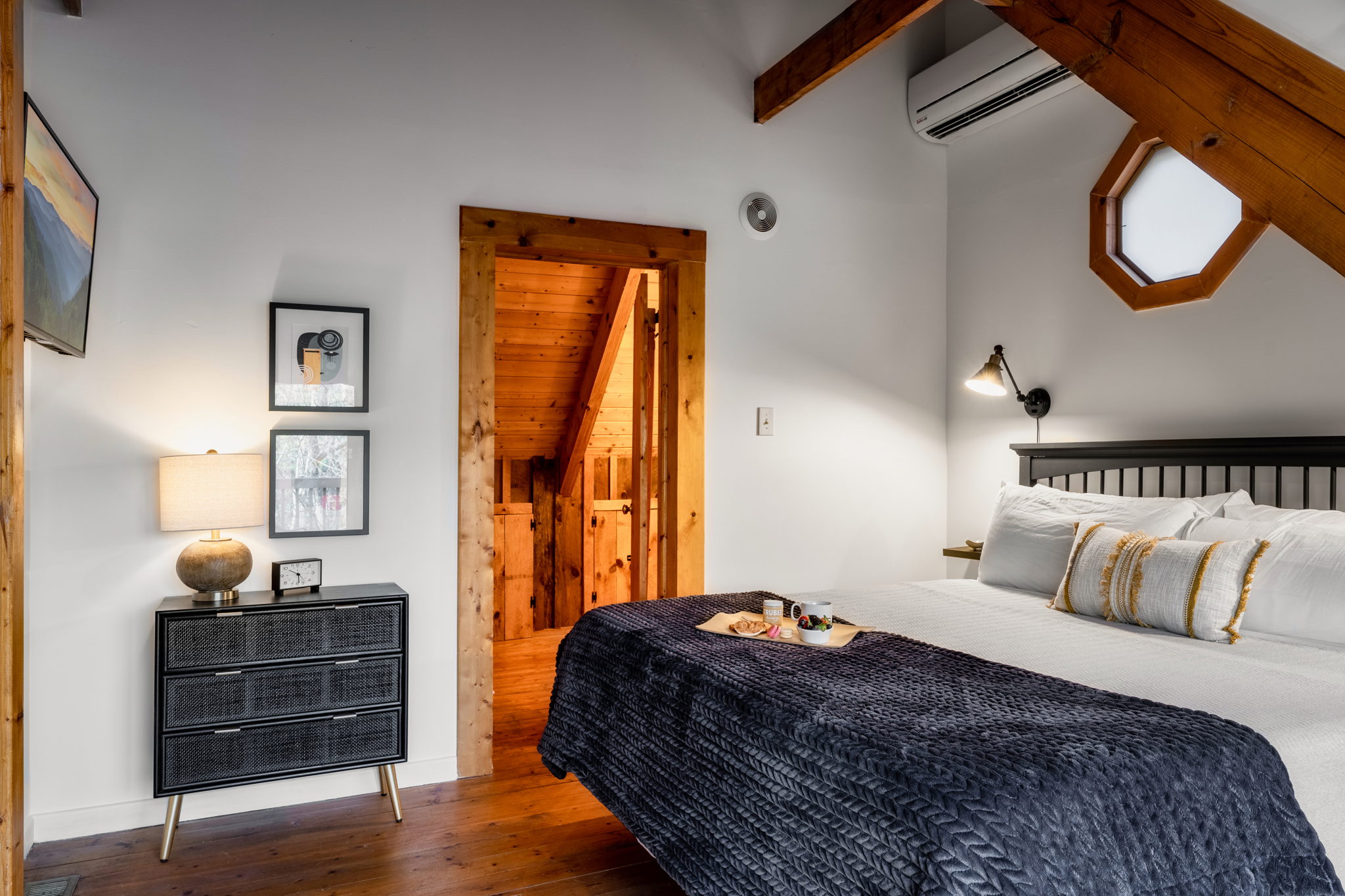 Sink into comfort and unwind in our cozy bedroom sanctuary.