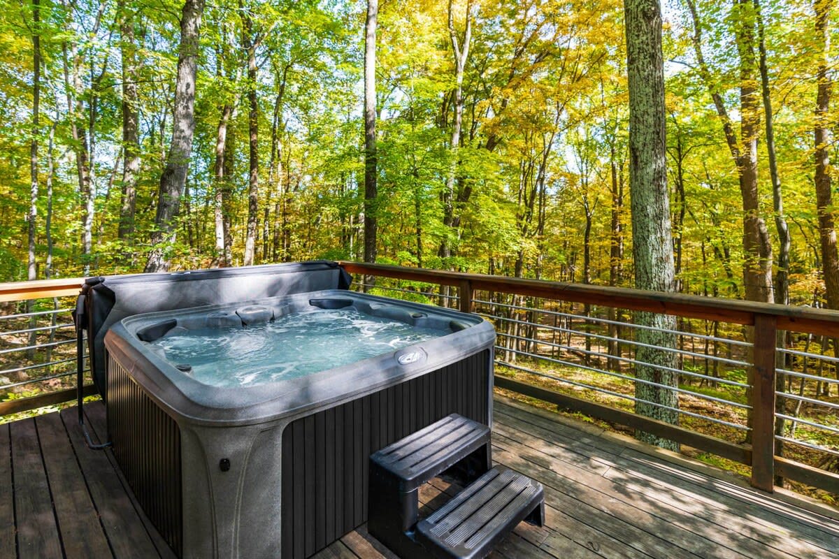 Take in the sounds of nature while relaxing in the hot tub.