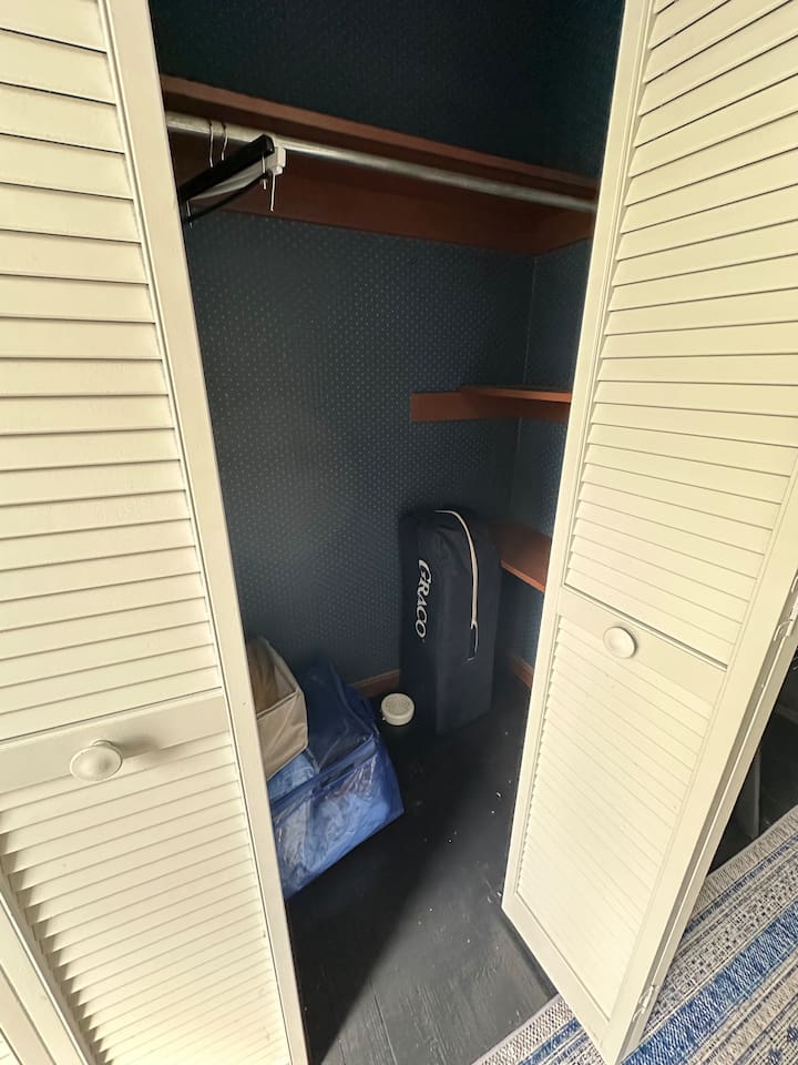 pack n play in upper back bedroom closet