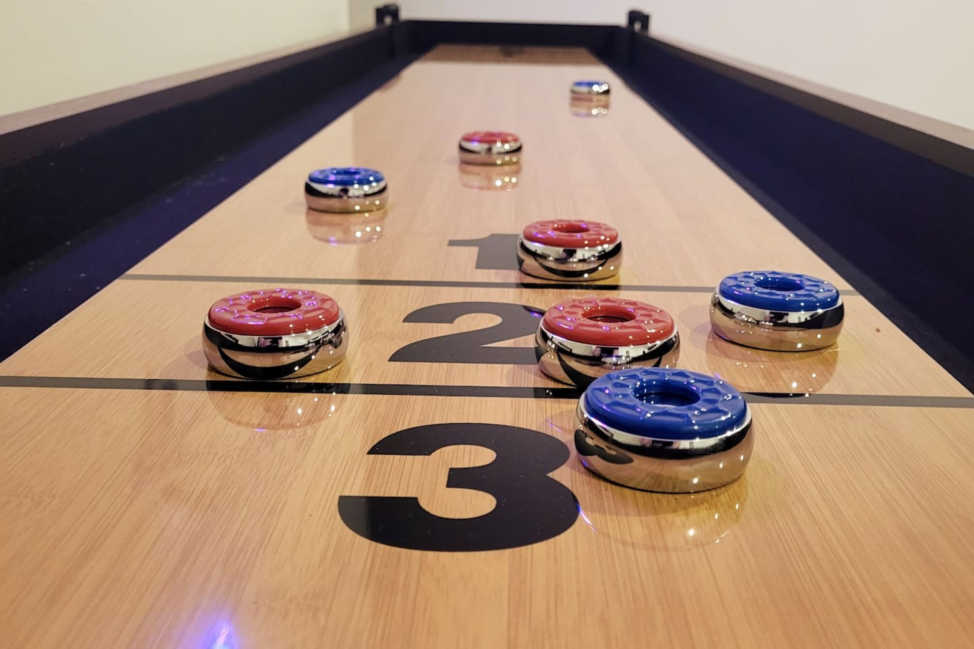 Garage Game Room - Our favorite game: shuffleboard!