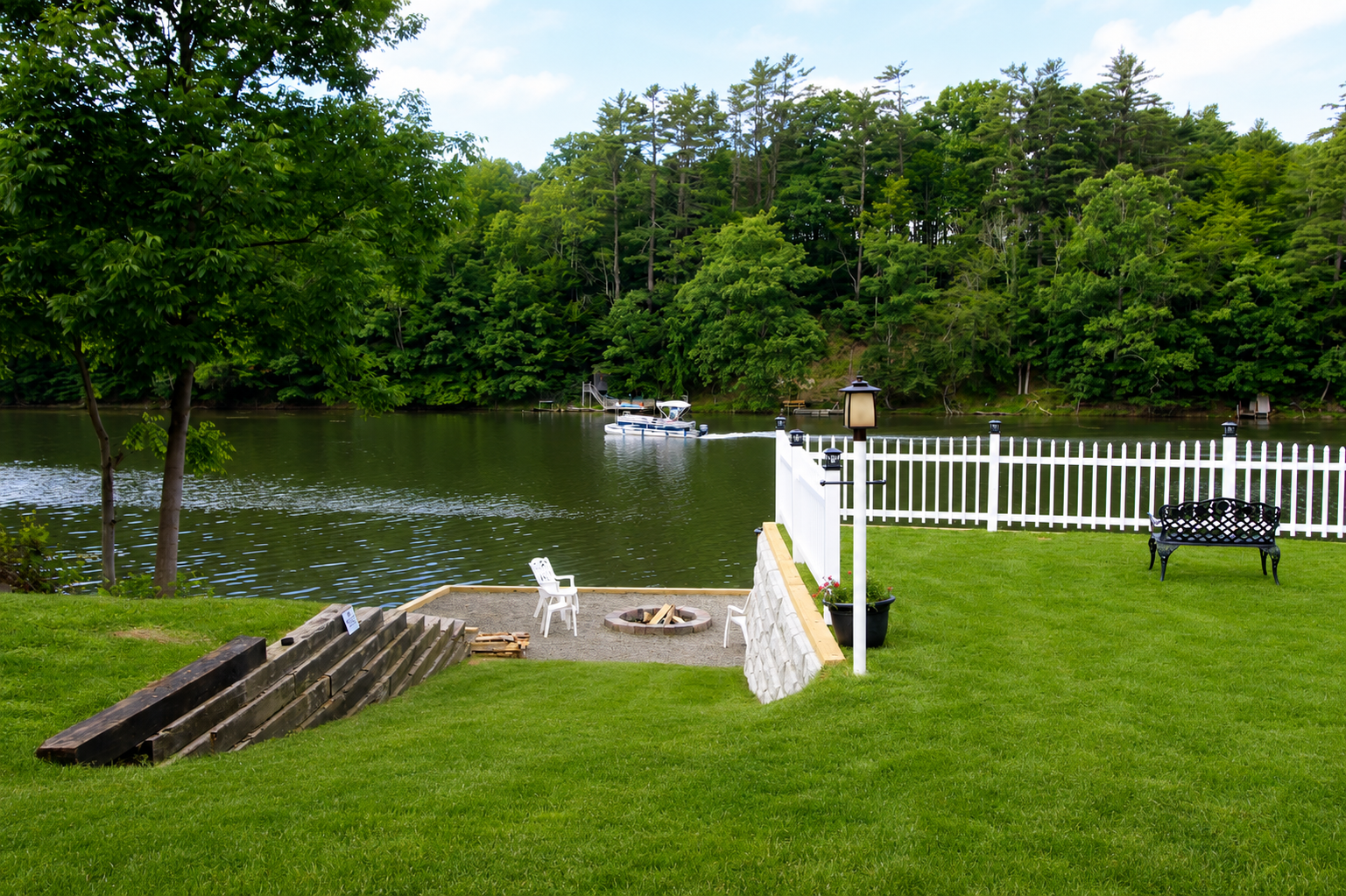 Relax and recharge by the newly updated firepit area at our peaceful Goodyear Lake retreat