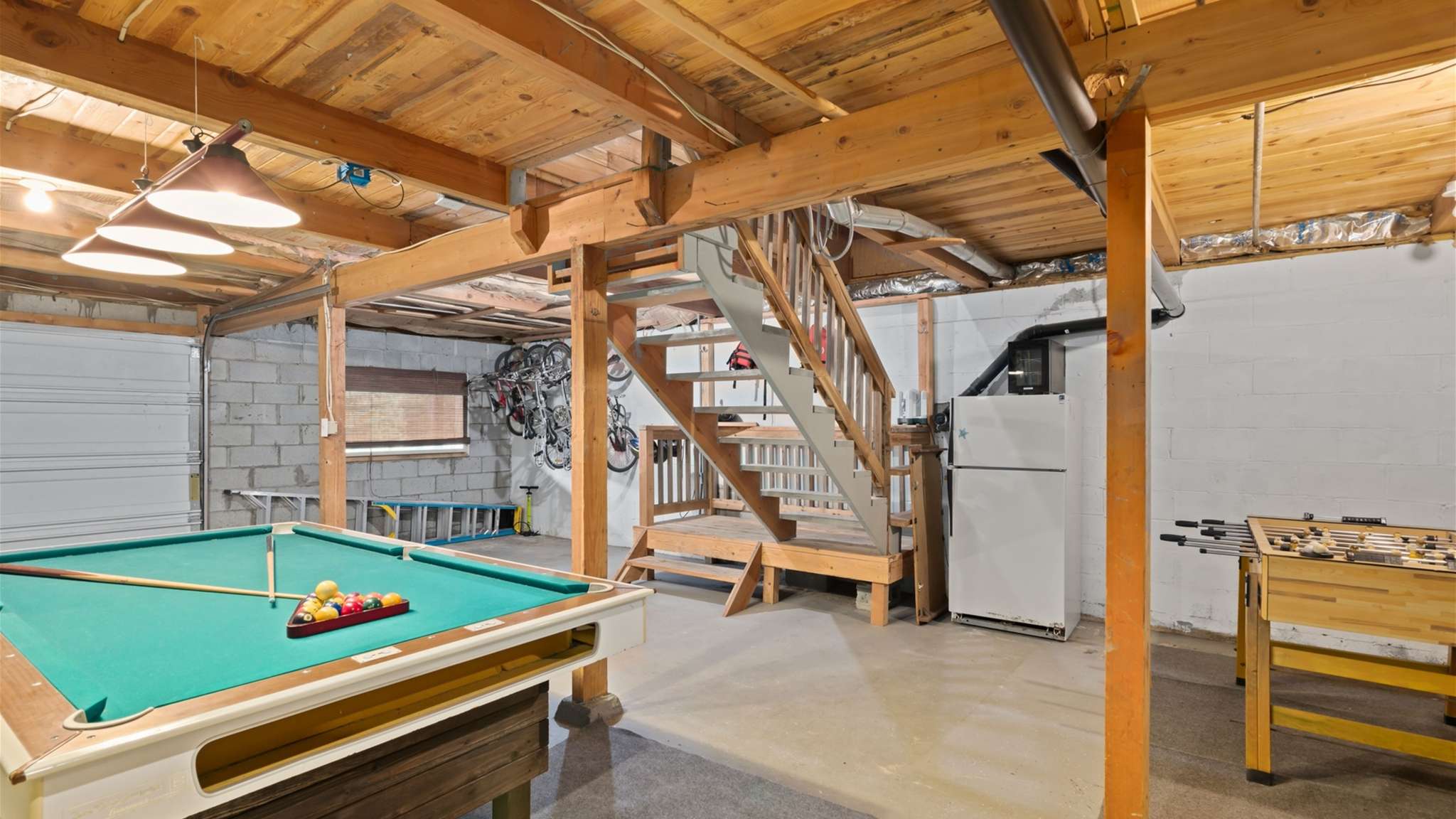 Spacious rec room for family competition and rainy-day fun.