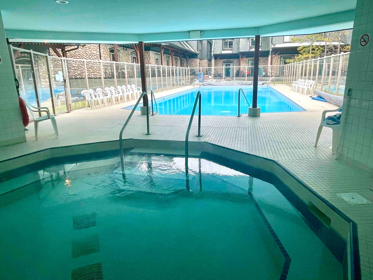 Hot tub, outdoor, opens onto the heated swimming pool