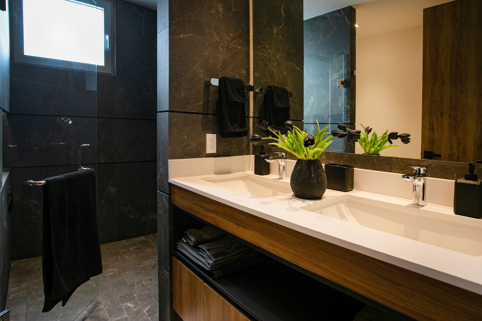 MASTER BATHROOM WITH A DUAL SHOWER AND RAIN SHOWER.