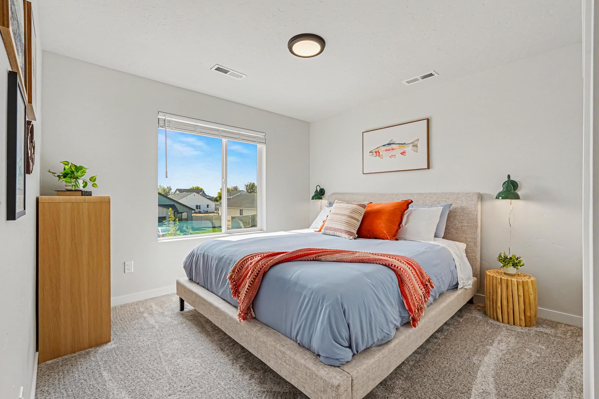 The second upstairs bedroom also features a comfortable California king-size bed.