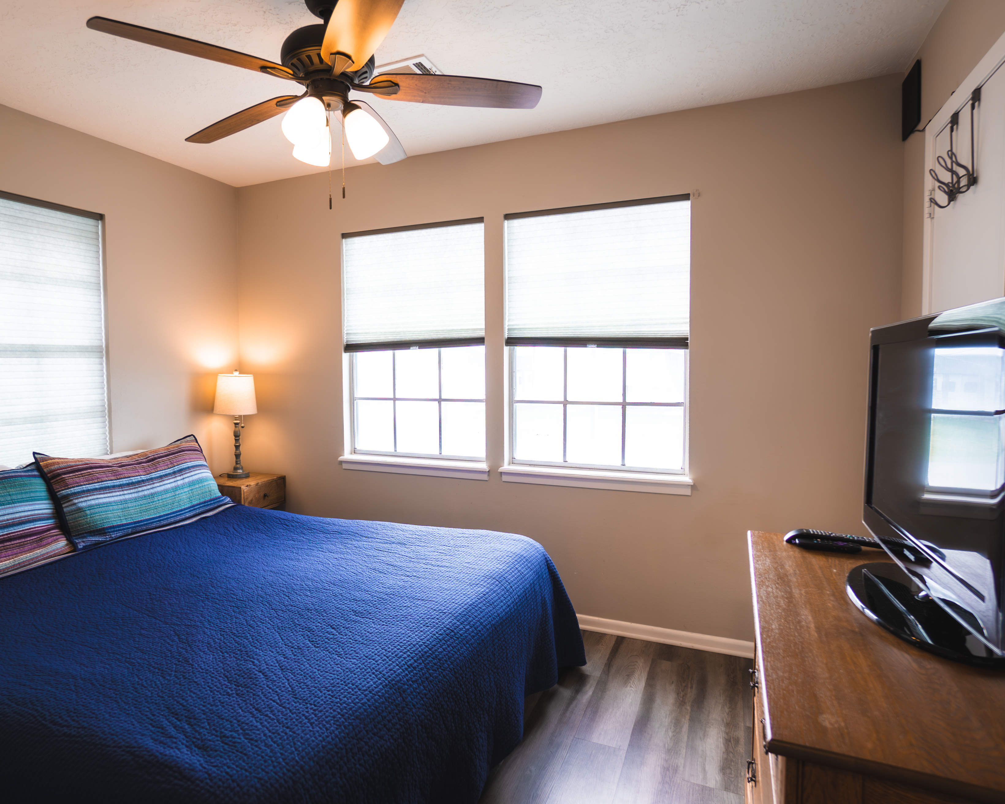 bedroom with king bed and smart TV