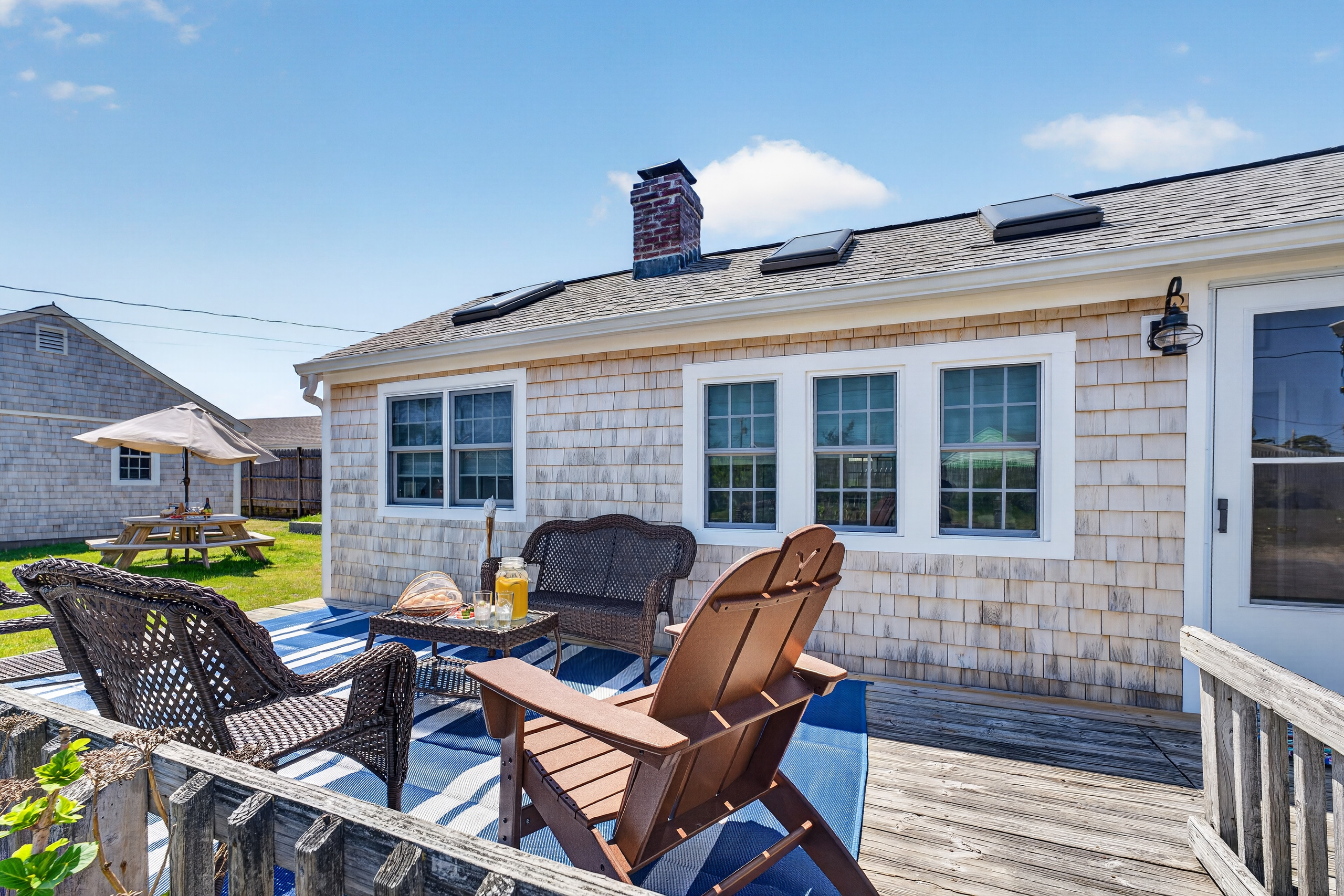 Seamless indoor-outdoor flow framed by fresh air, open sky, and tranquil coastal ambiance.