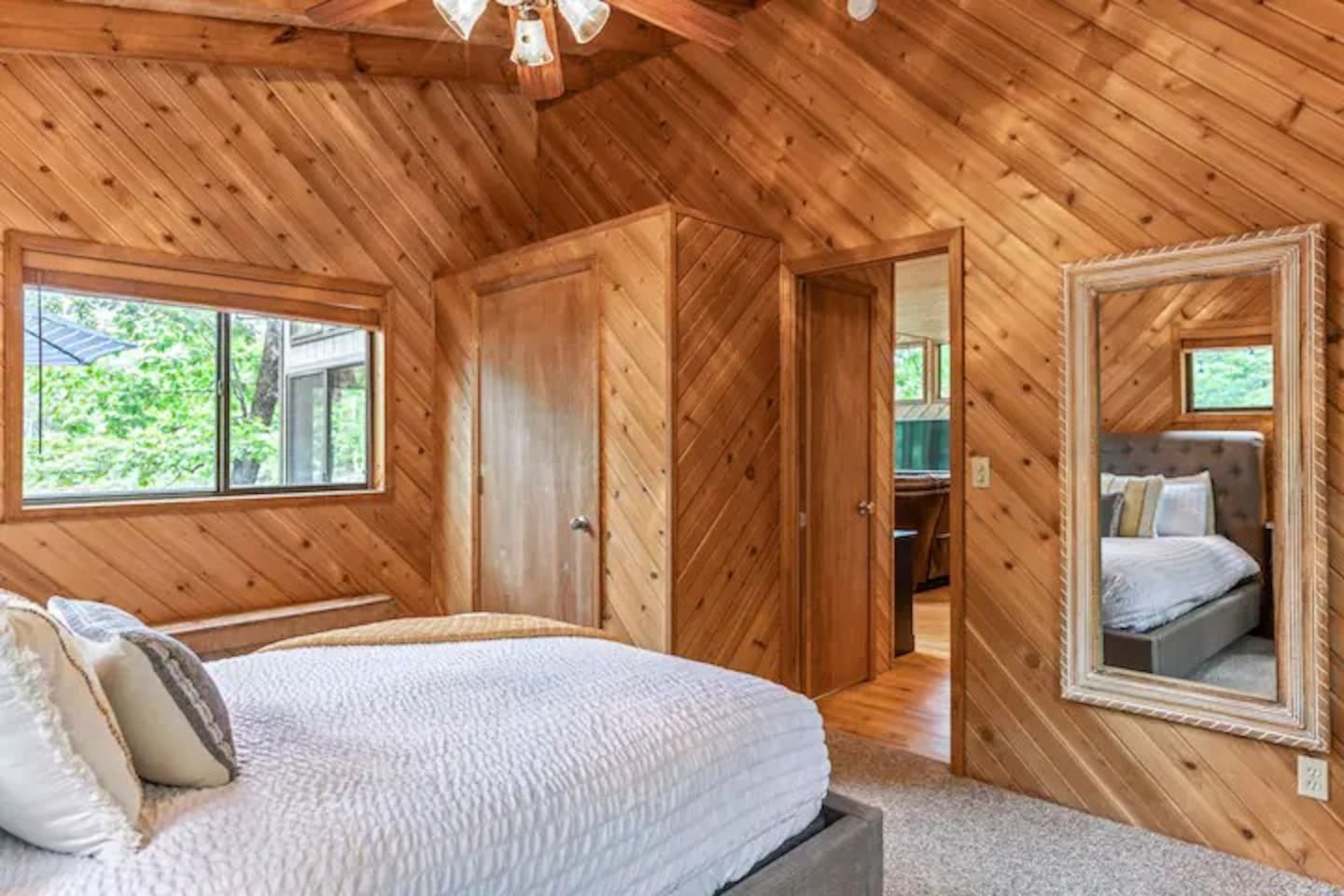 Main level bedroom with queen bed