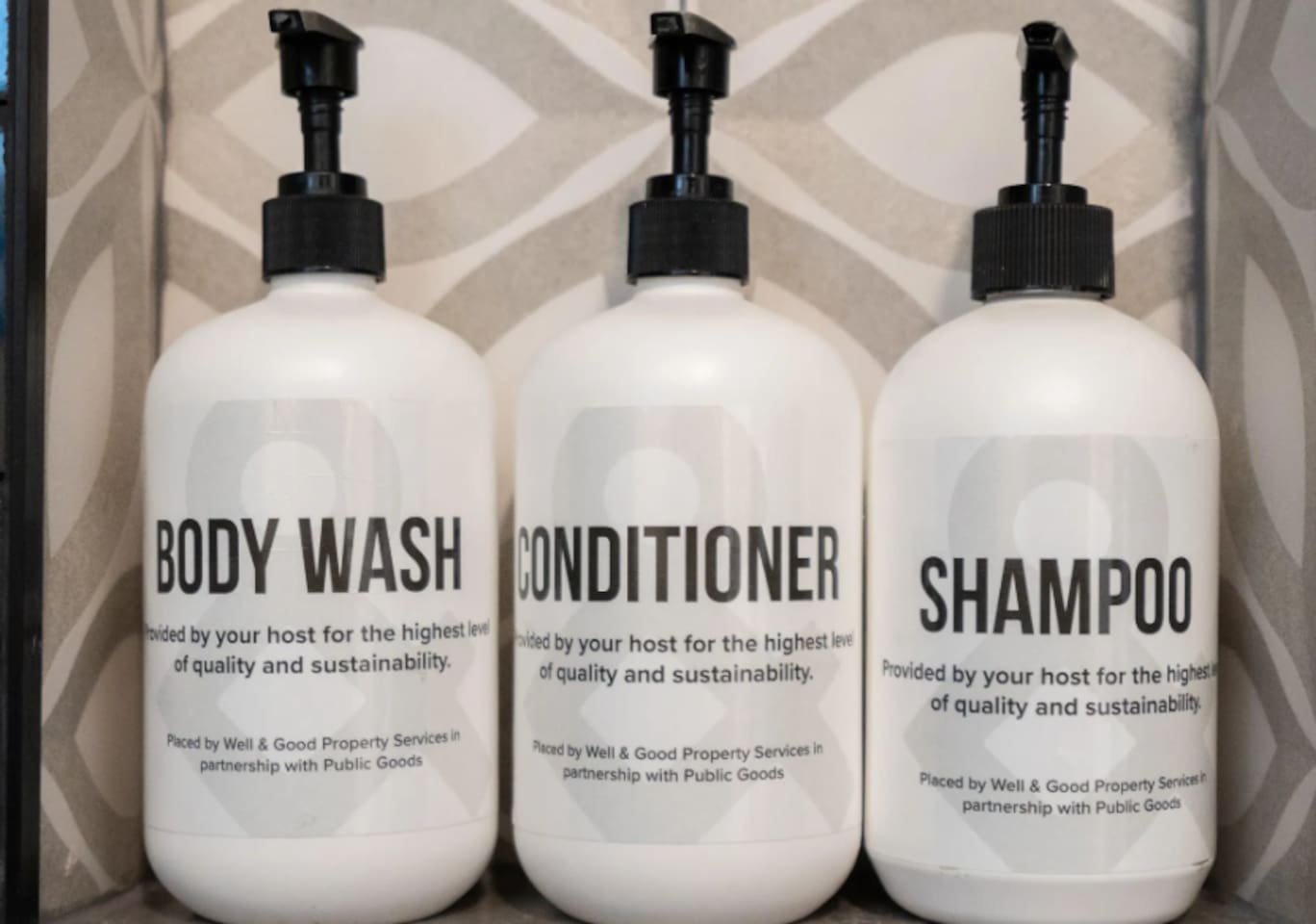 Full-size body wash, conditioner, and shampoo, stocked and ready — the small details that make a stay feel taken care of.