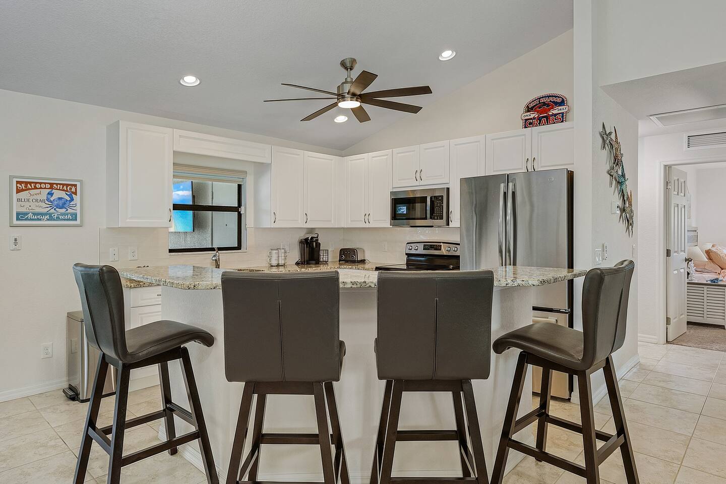 Kitchen island featuring seating for 4, perfect for gathering and casual dining!
