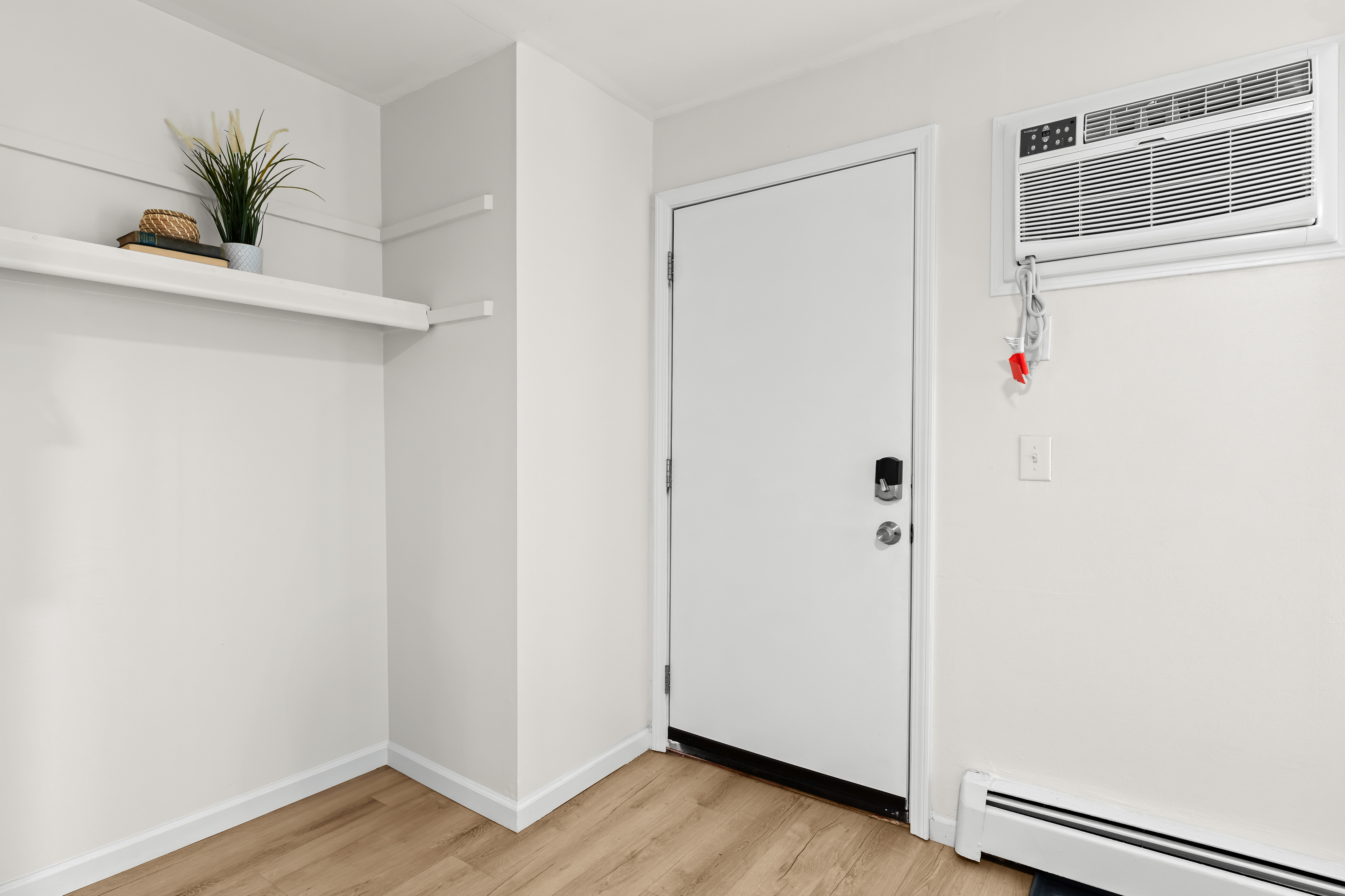 Private entrance with keyless entry and in-unit A/C for comfort and convenience.