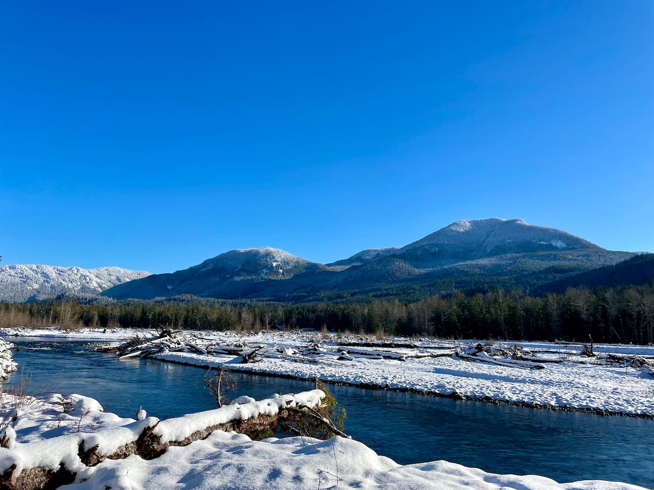 Enjoy the view of the Cowlitz River across the street with a beautiful blanket of winter snow during ski season